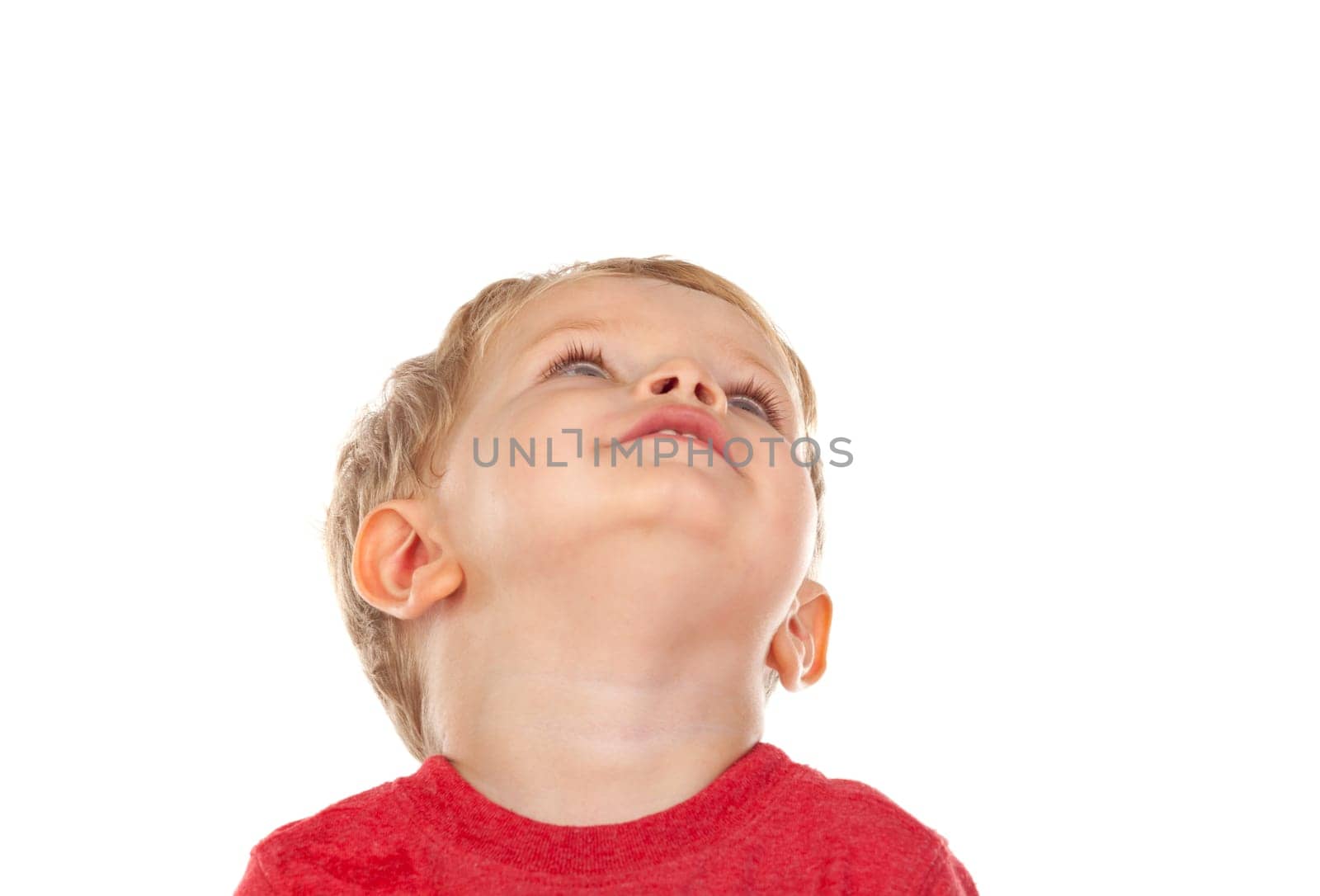 Beautiful little child two years old laughing isolated on a white background