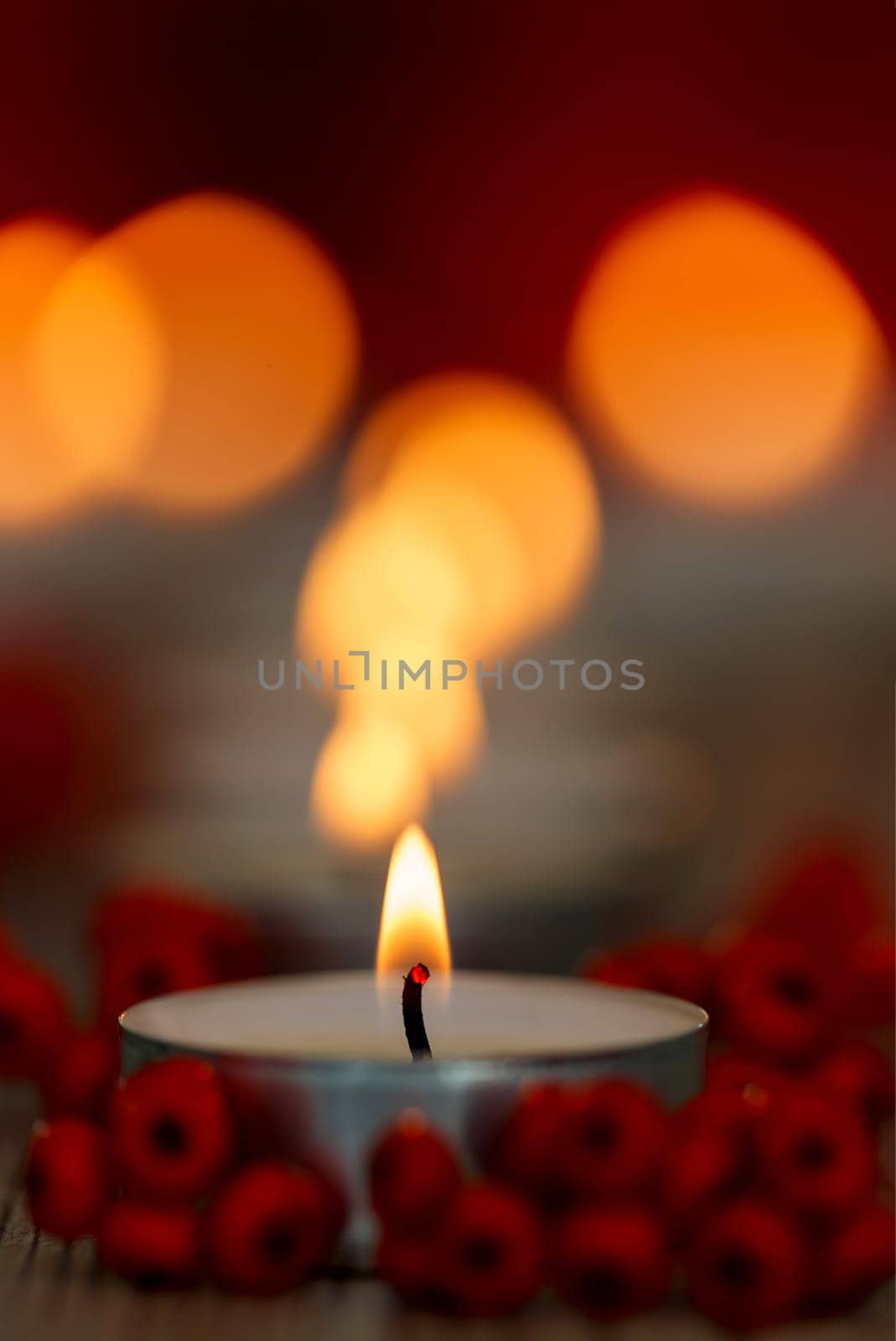 Christmas candles with berries. Decoration for holidays