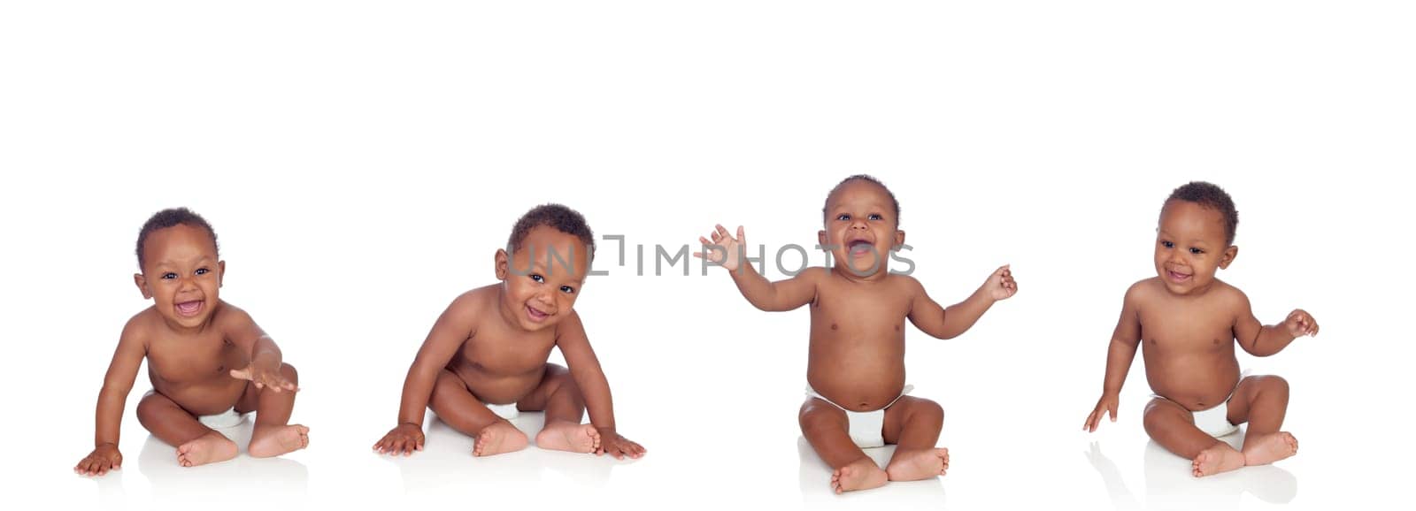 Four funny african baby sitting on the floor isolated on white background