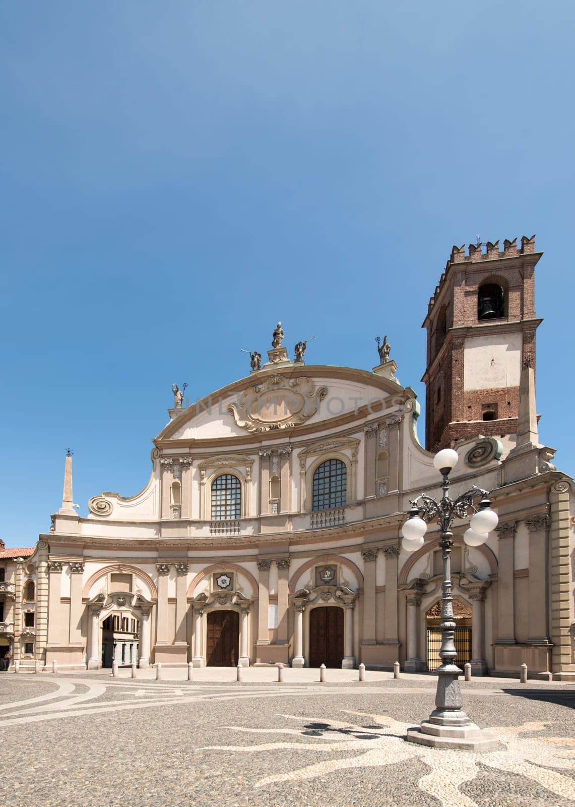 view of monumental cathedral in central renaissance square, shot in summer bright light.