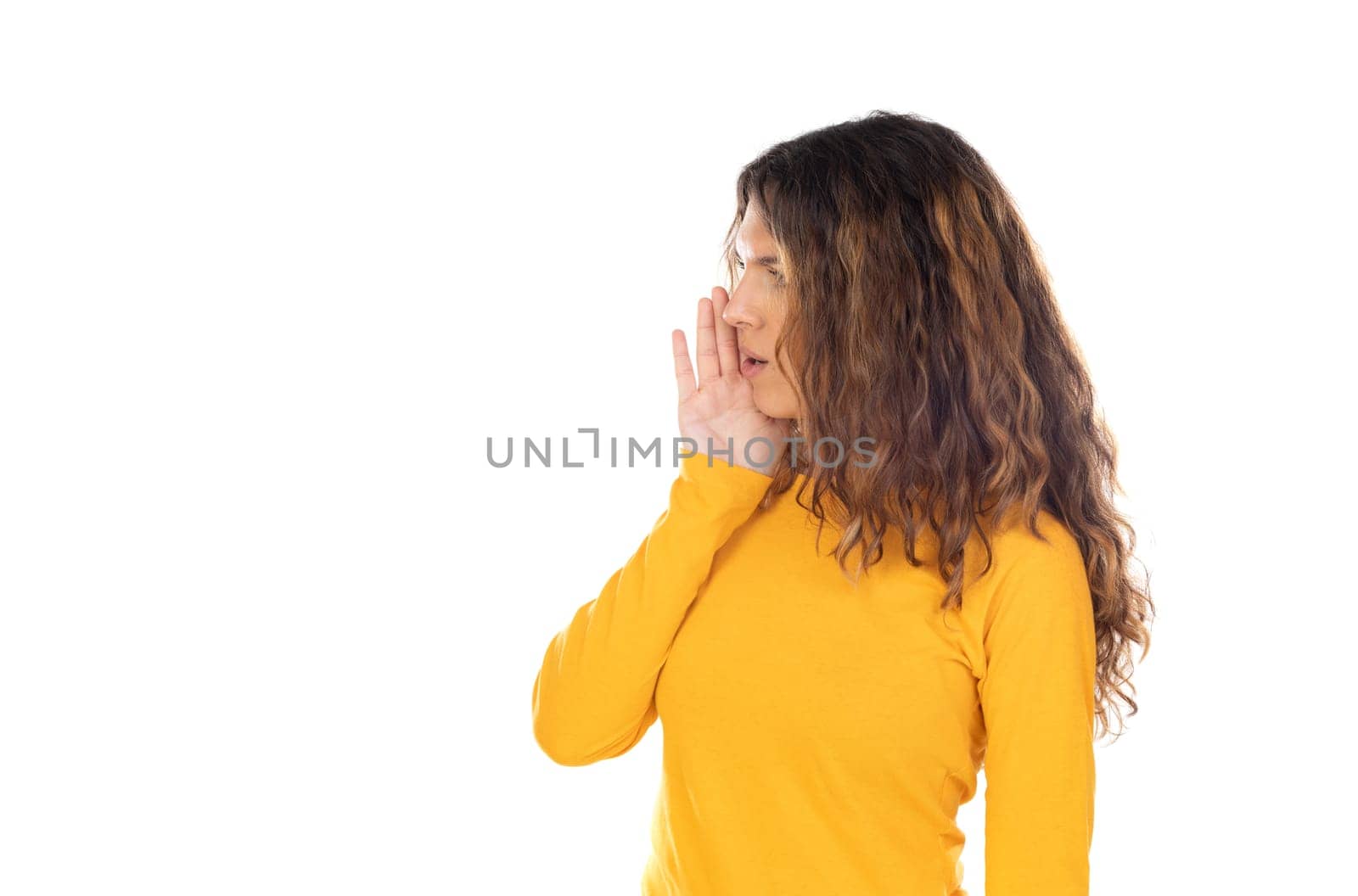 Beautiful woman with wavy hair isolated on a white background