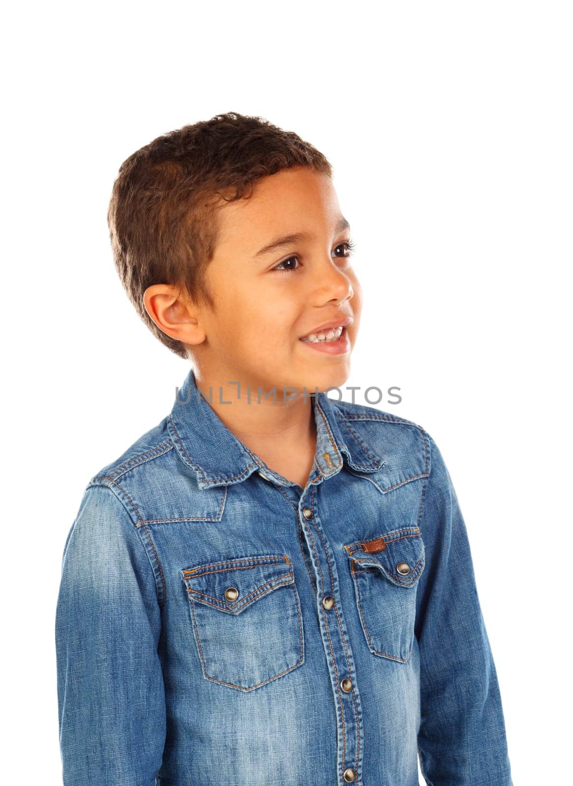 Funny small child with dark hair and black eyes crossing his arms isolated on a white background