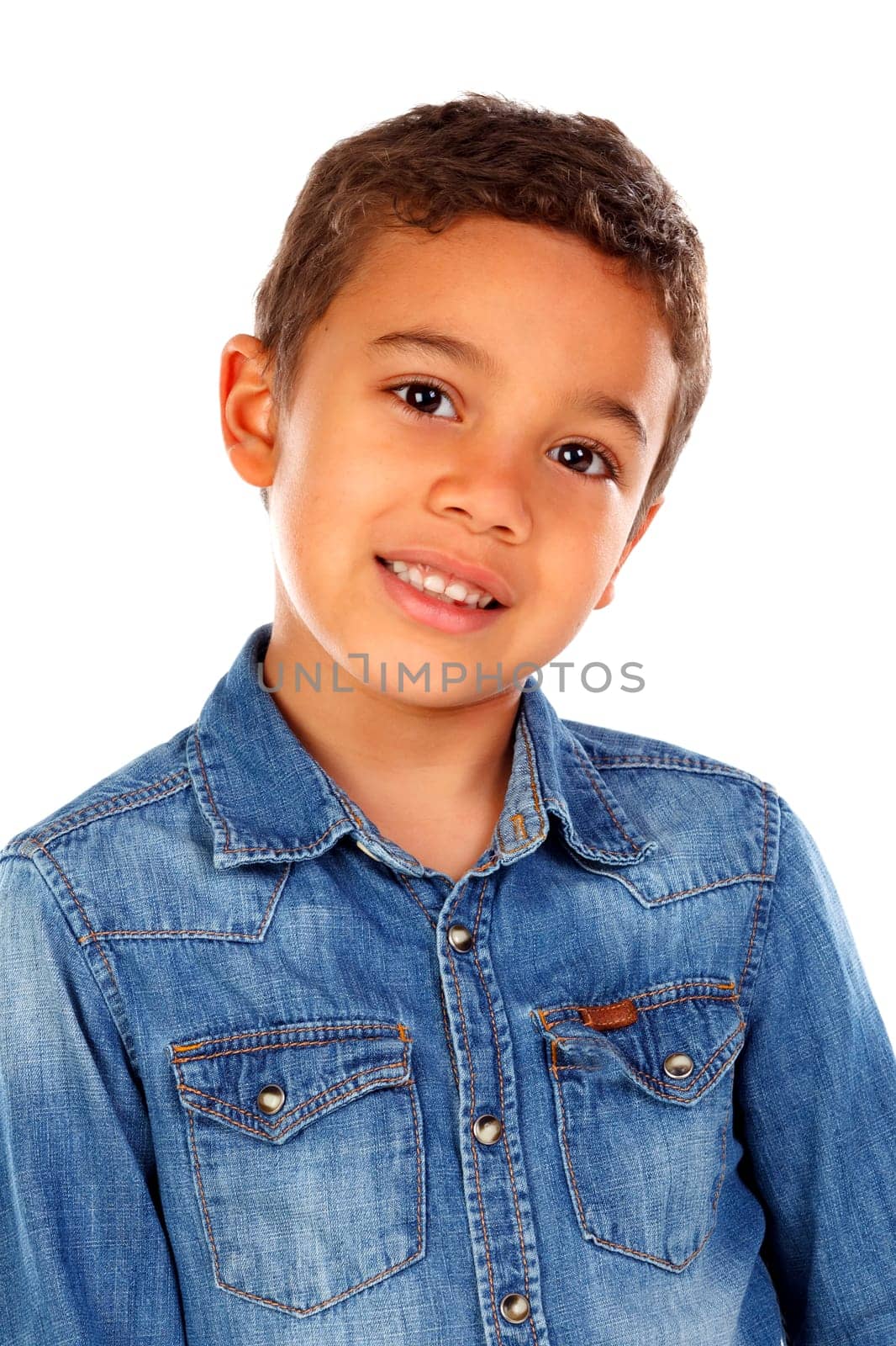 Funny small child with dark hair and black eyes crossing his arms isolated on a white background