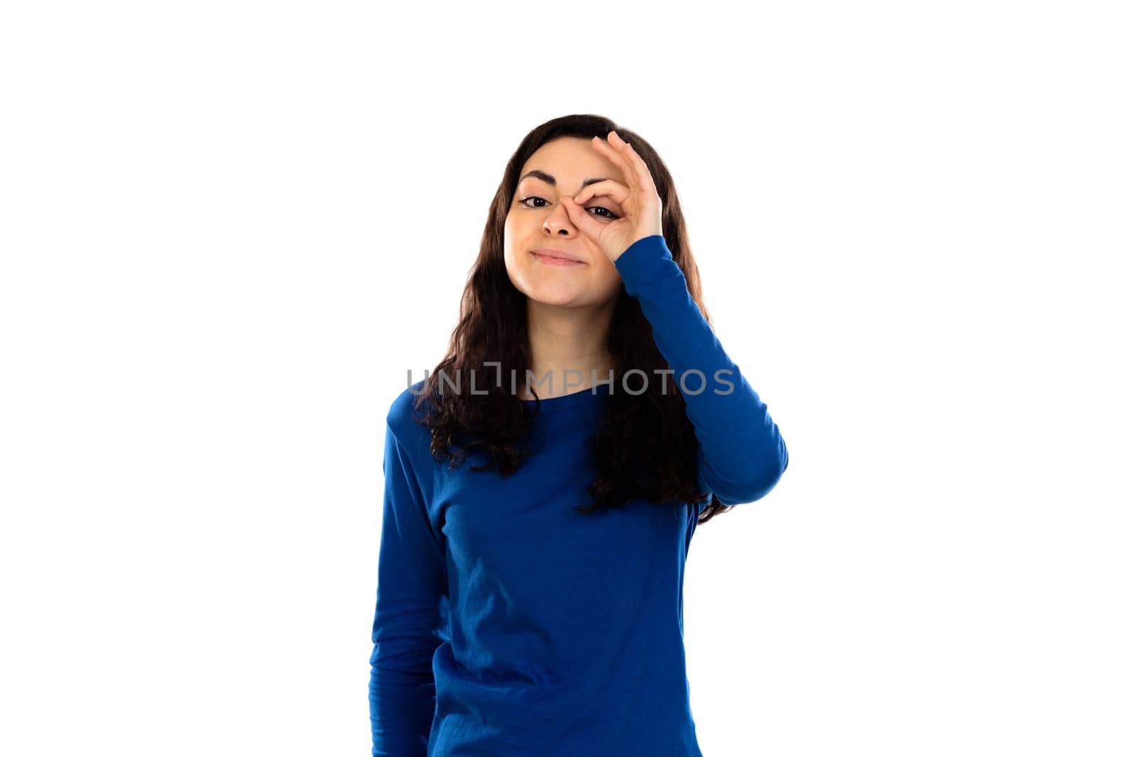 Adorable teenage girl with blue sweater isolated on a white background