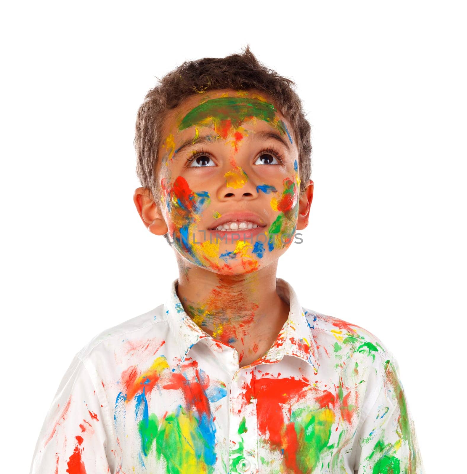 Funny boy with hands and face full of paint isolated on a white background
