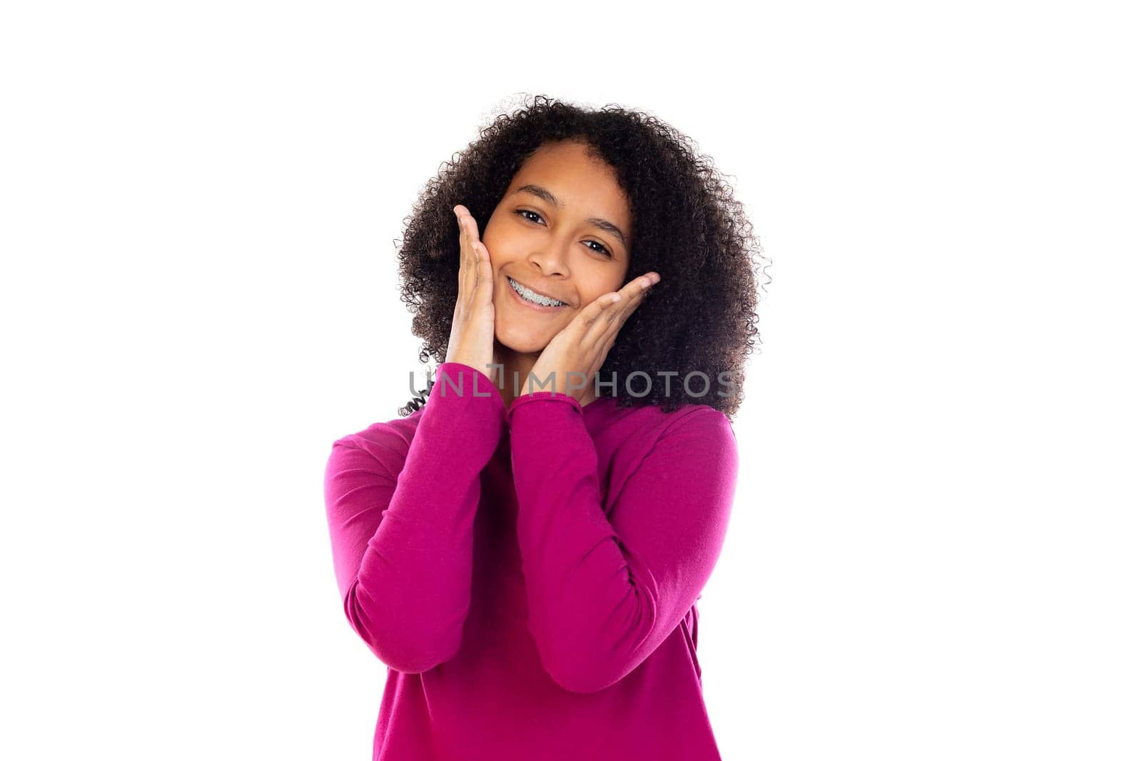 Beautiful teenager girl with pink sweater isolated on a white background