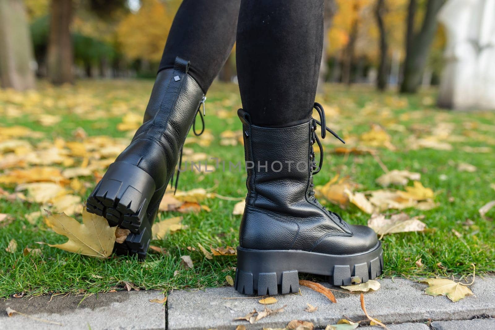 Elegant women's shoes on the foot on the street. Comfort and fashion. High quality photo