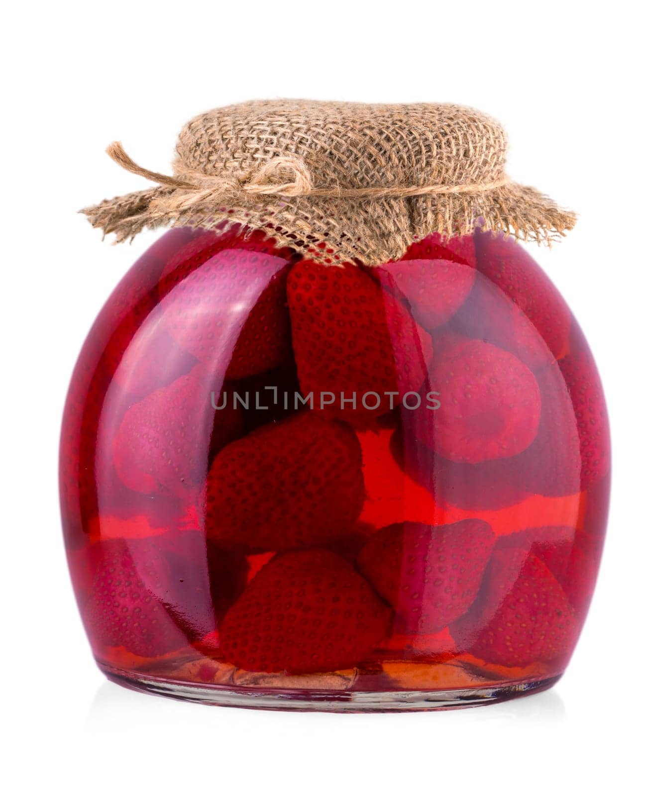 The Strawberry jam jar with burlap isolated on white background