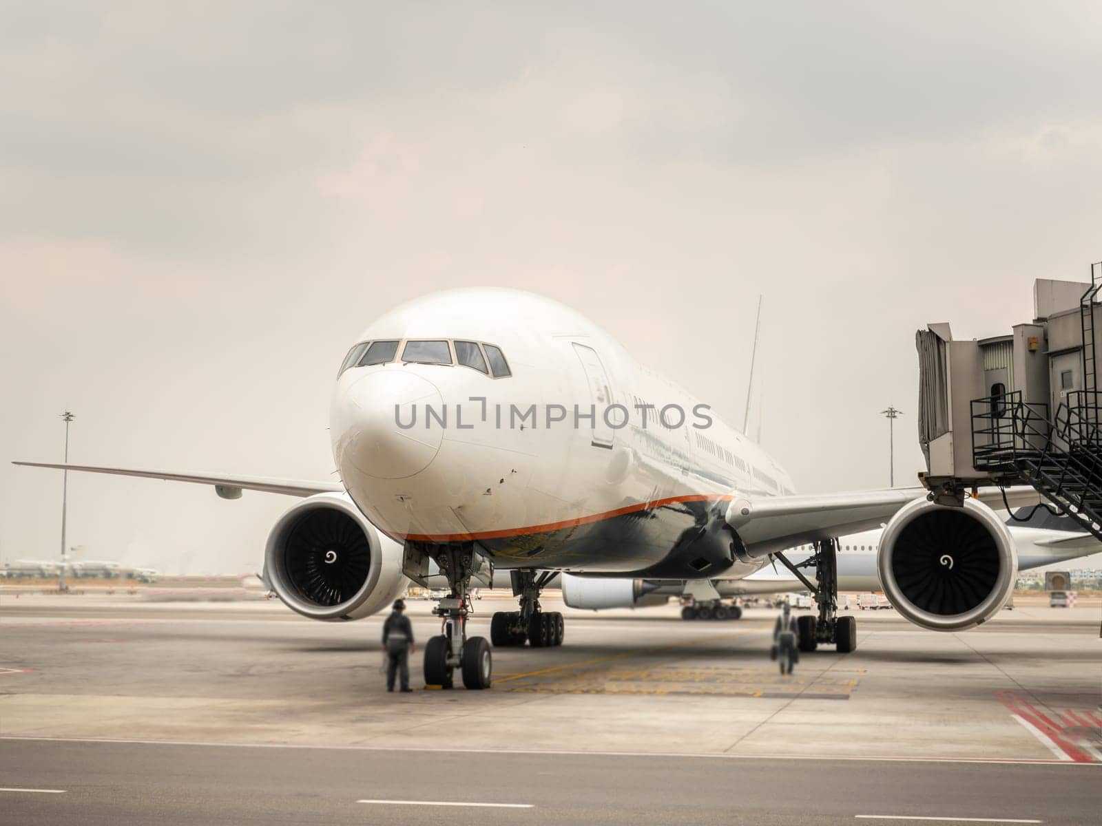 Airplane near the terminal in an airport cockpit