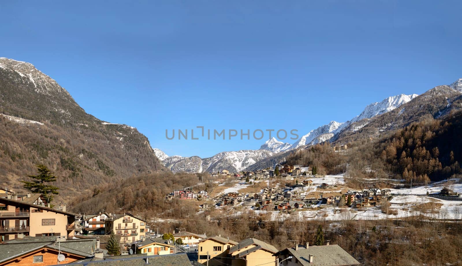 view of small touristic village, shot in bright winter light at Caspoggio,  Valtellina, Lombardy, Italy.