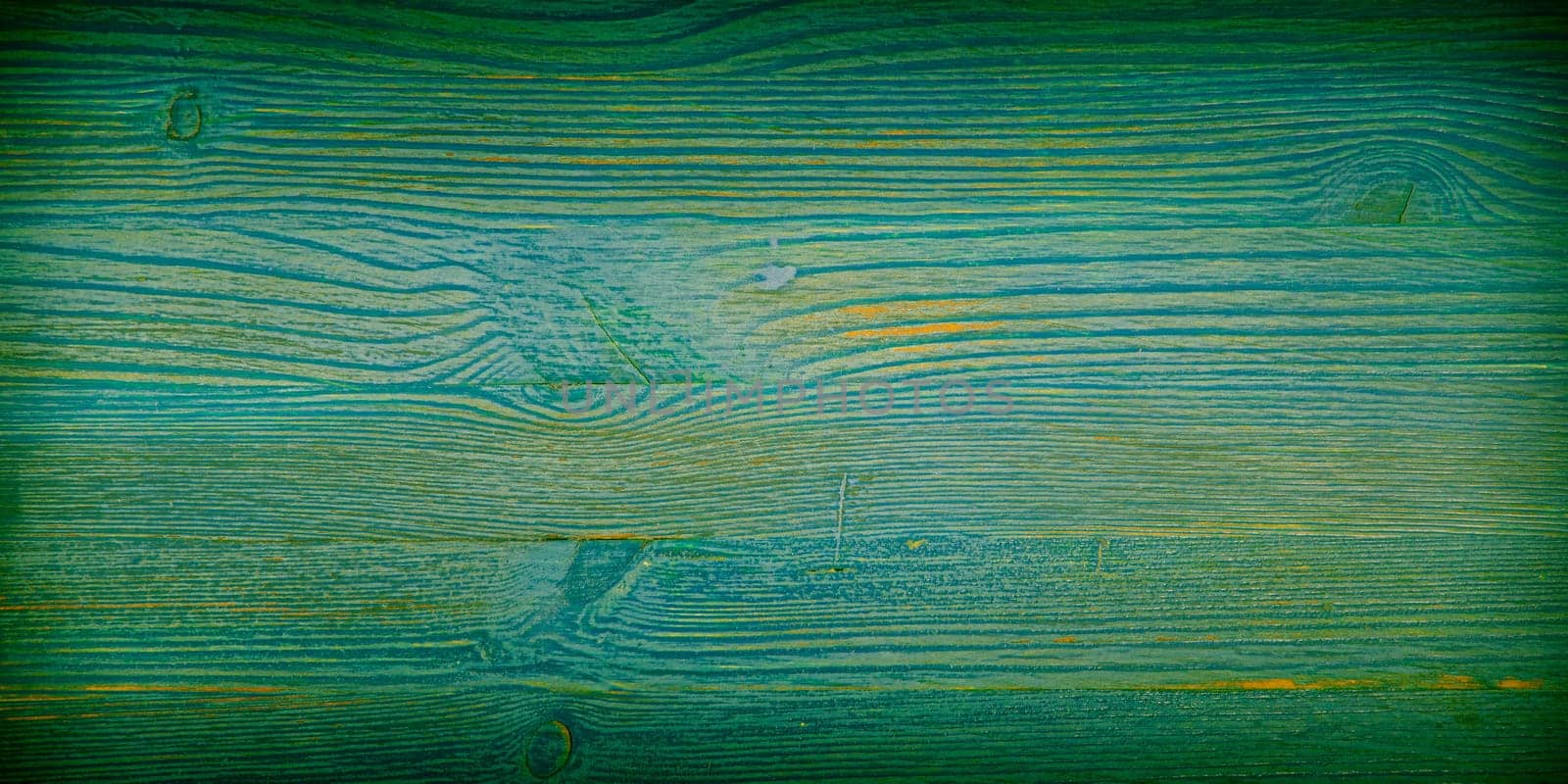 Old wooden background with horizontal green boards. layout, space for text and logo.