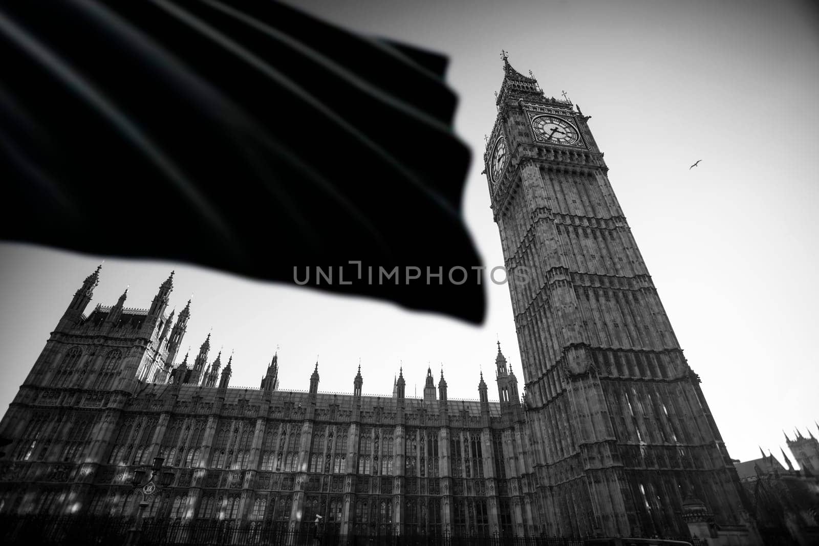 The Big Ben in Westminster with black flag. UK national mourning and sorrow concept.
