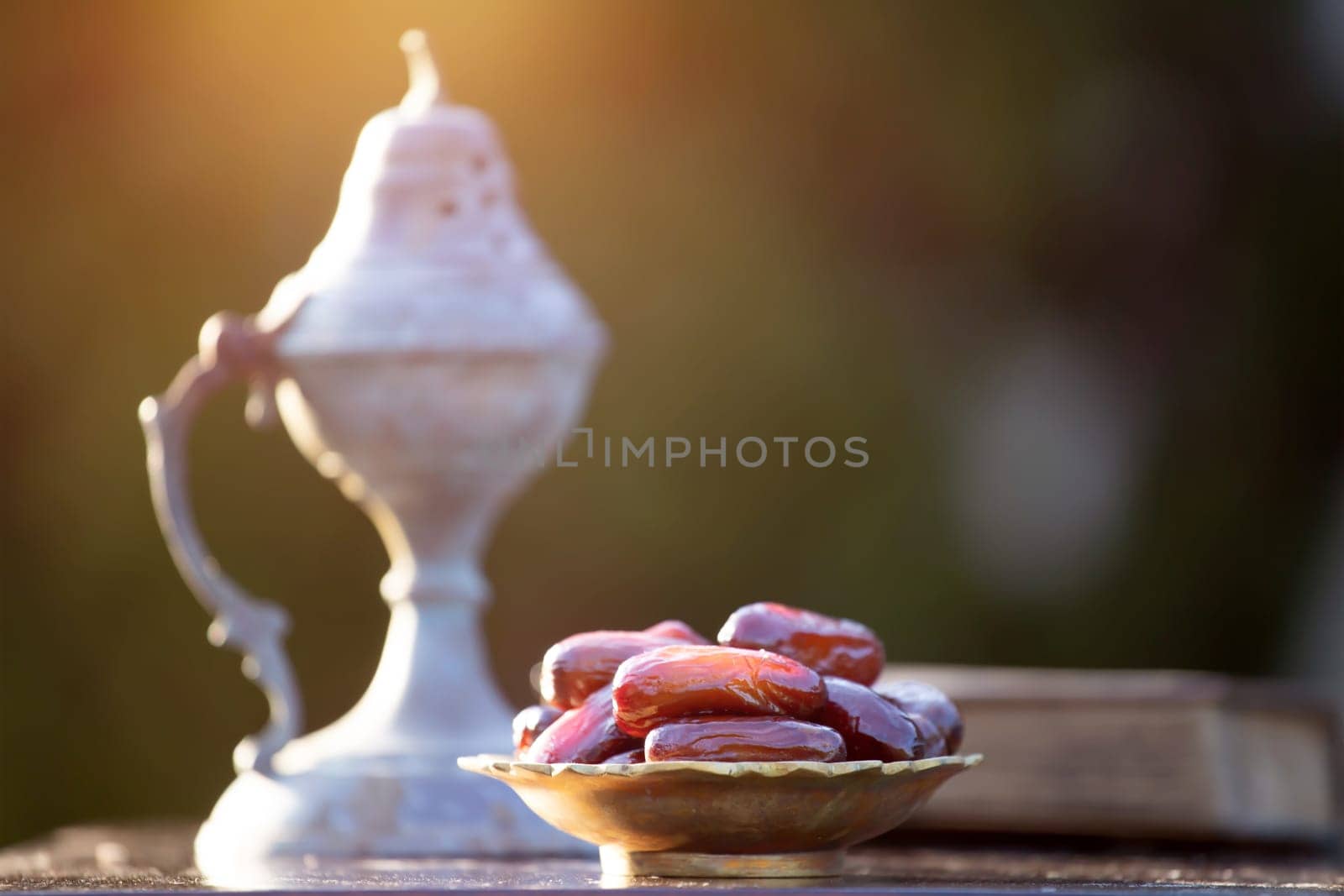 Festive greeting card for Muslim holy month Ramadan Kareem with dates, Quaran and censer