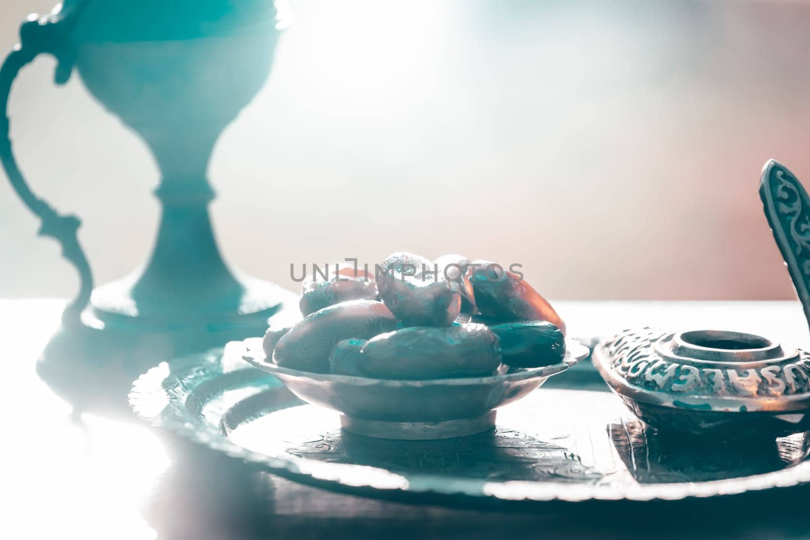 Festive greeting card for Muslim holy month Ramadan Kareem with dates, Quaran and censer