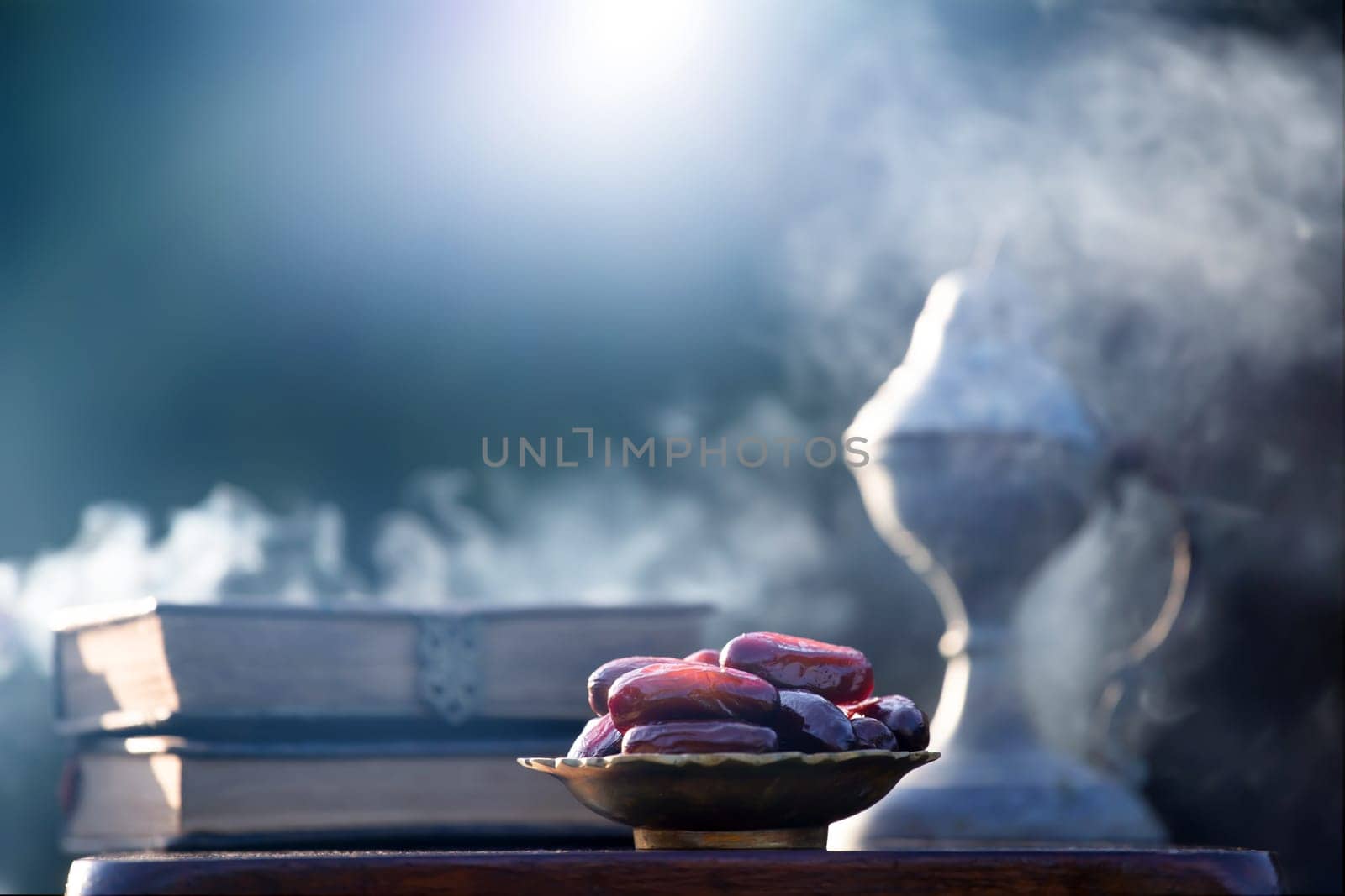 Festive greeting card for Muslim holy month Ramadan Kareem with dates, Quaran and censer