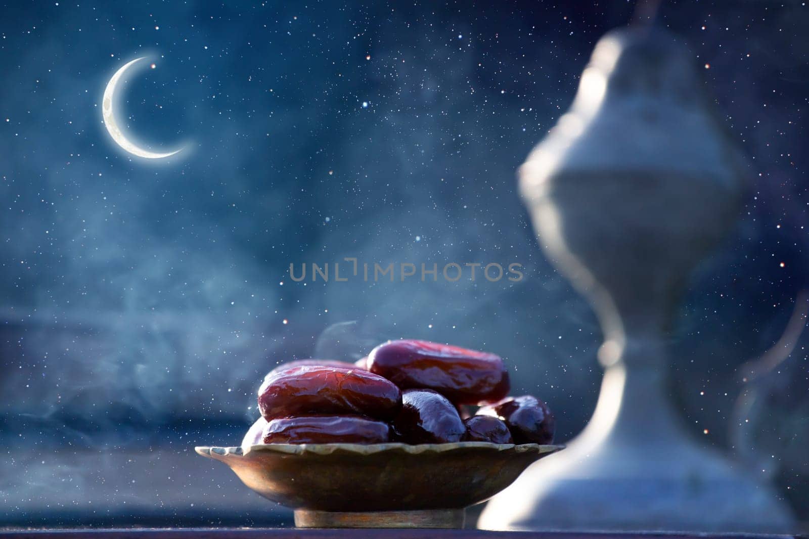 Festive greeting card for Muslim holy month Ramadan Kareem with dates, Quaran, censer and crescent moon.