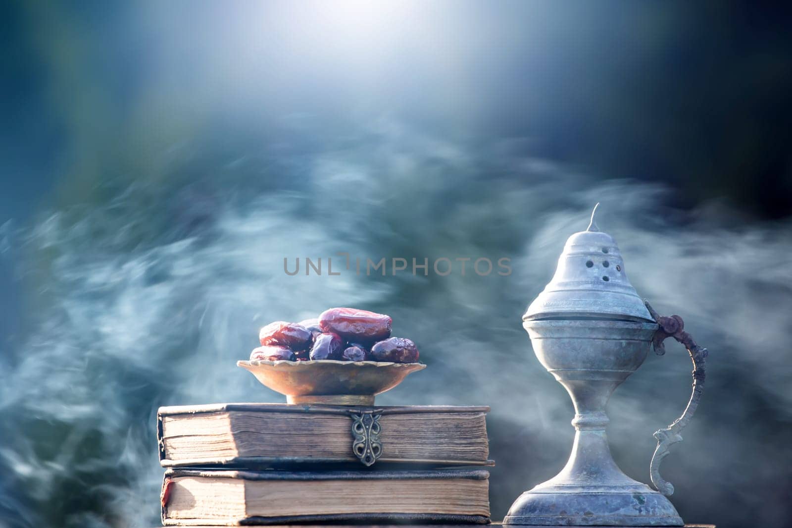 Festive greeting card for Muslim holy month Ramadan Kareem with dates, Quaran and censer
