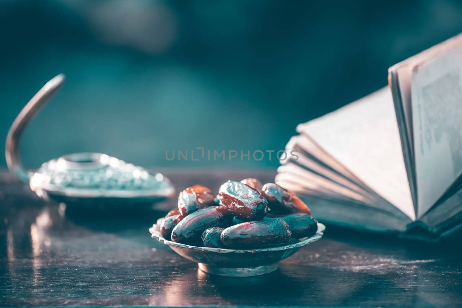 Festive greeting card for Muslim holy month Ramadan Kareem with dates, Quaran and censer