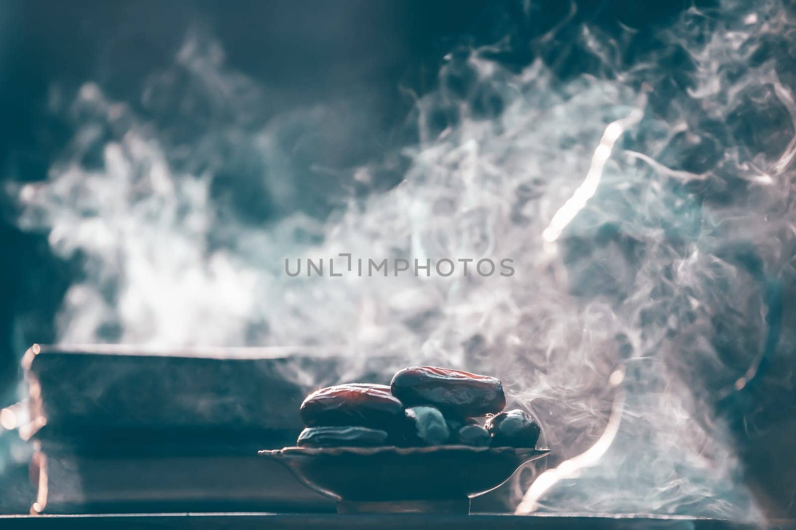 Festive greeting card for Muslim holy month Ramadan Kareem with dates, Quaran and censer