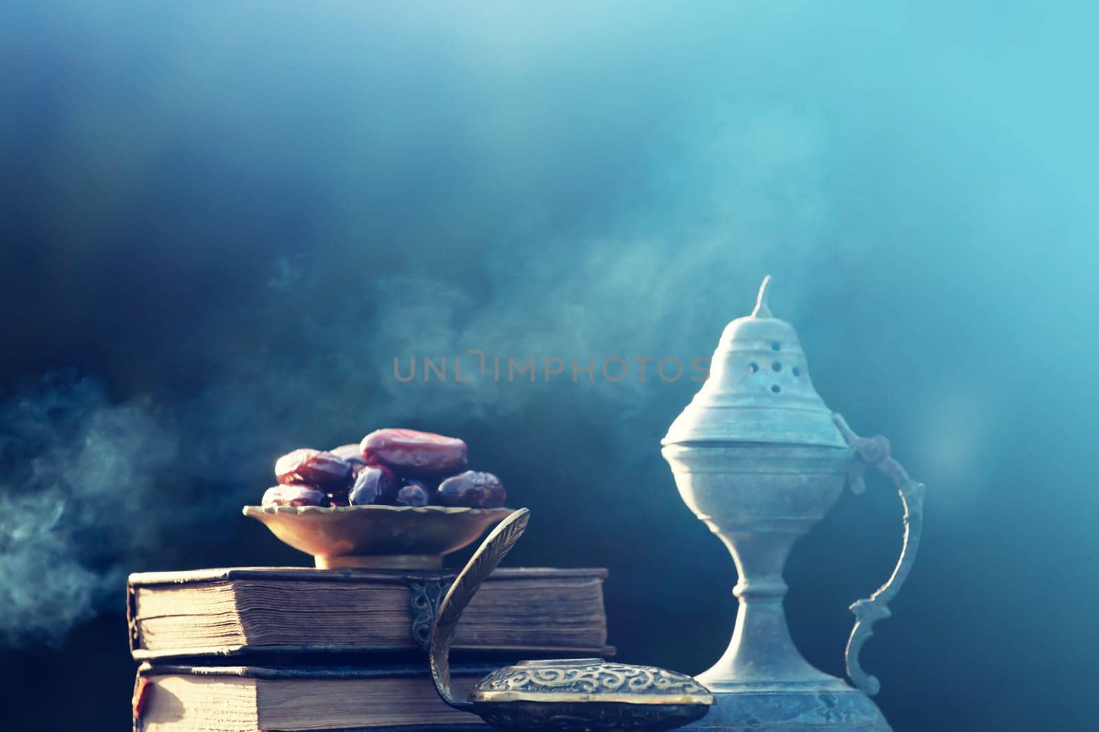 Festive greeting card for Muslim holy month Ramadan Kareem with dates, Quaran and censer