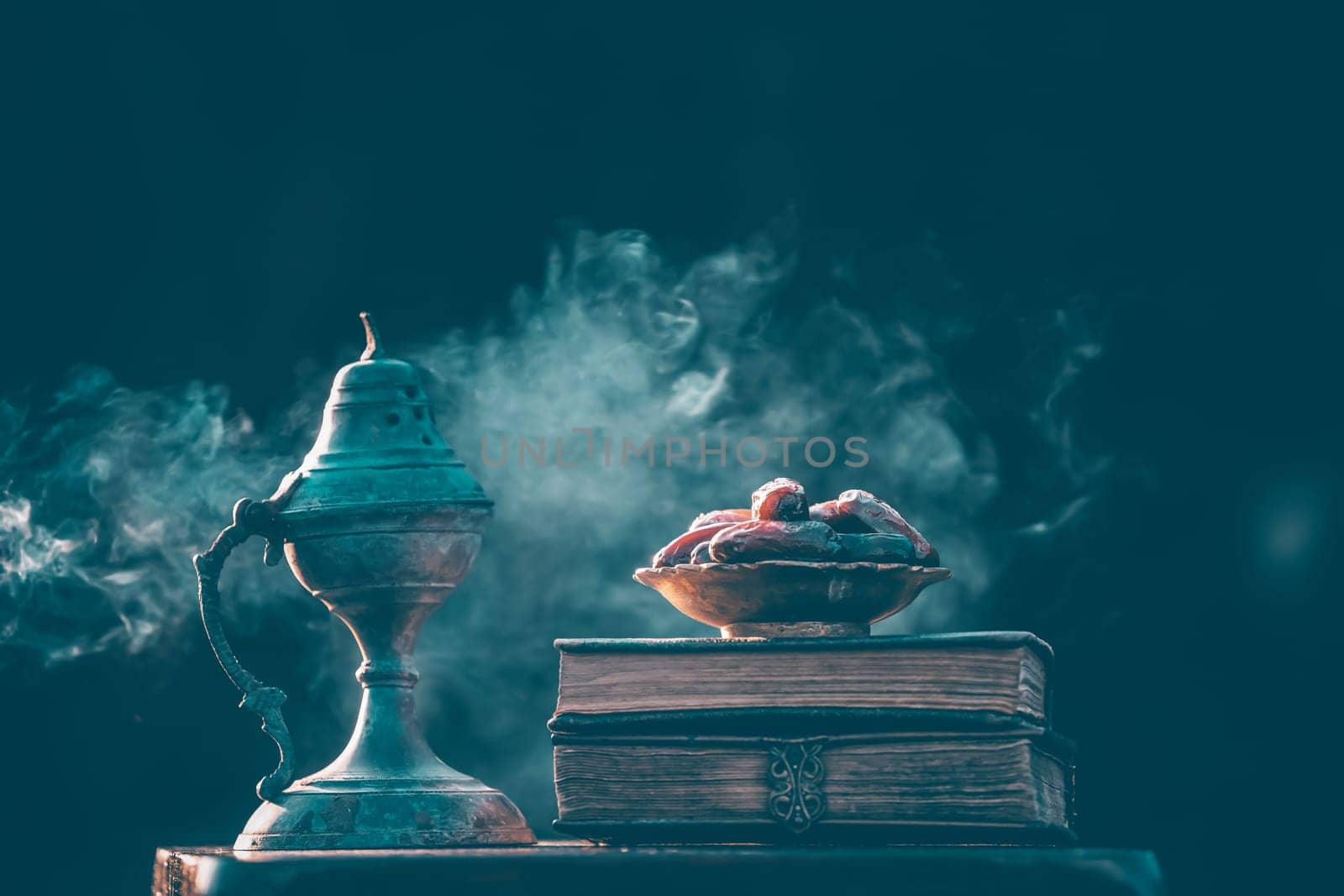 Festive greeting card for Muslim holy month Ramadan Kareem with dates, Quaran and censer