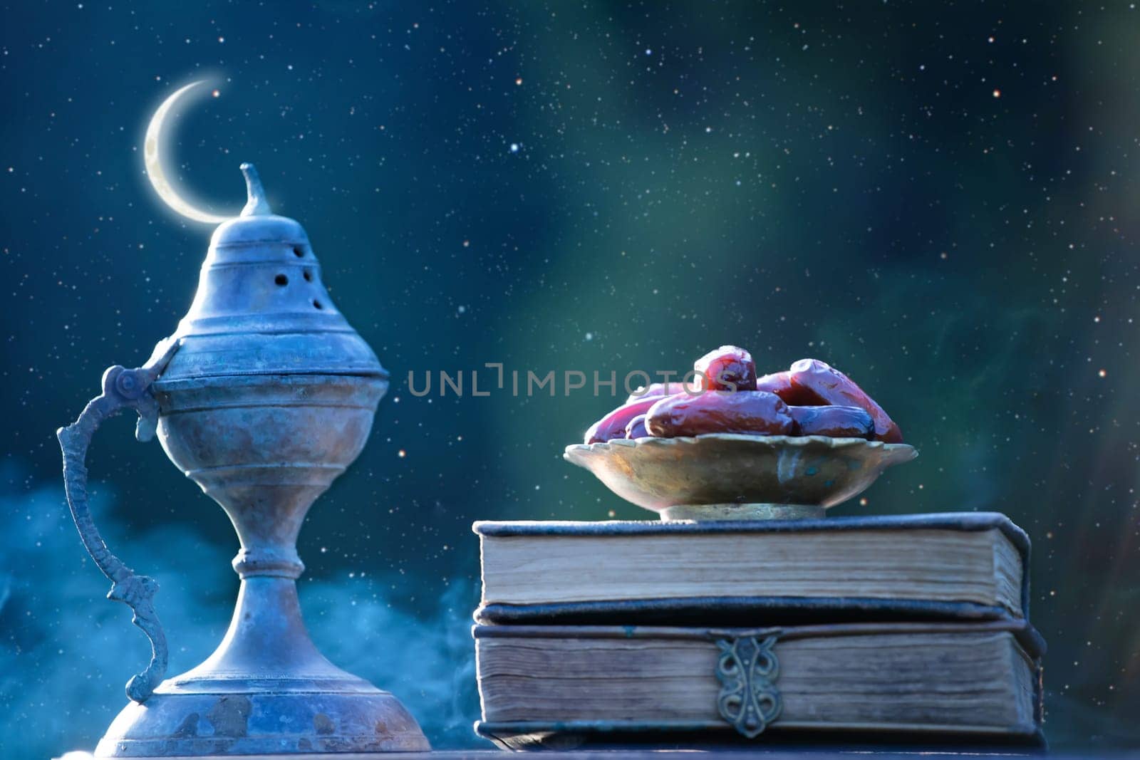 Festive greeting card for Muslim holy month Ramadan Kareem with dates, Quaran, censer and crescent moon.