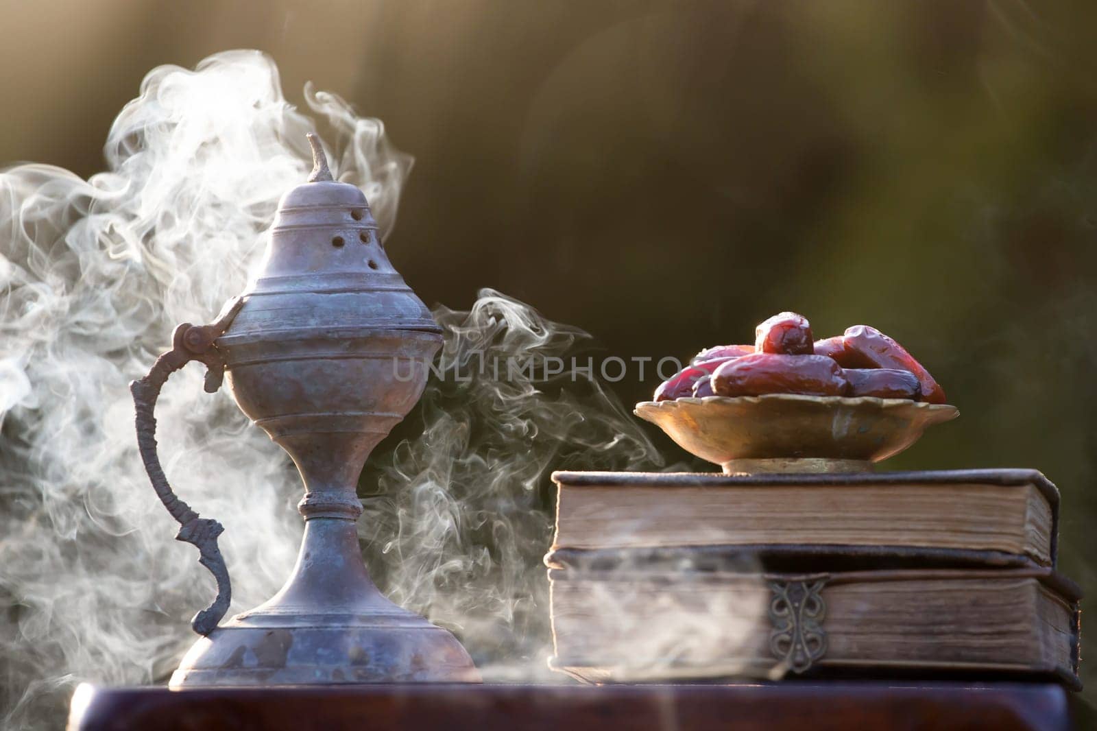 Festive greeting card for Muslim holy month Ramadan Kareem with dates, Quaran and censer