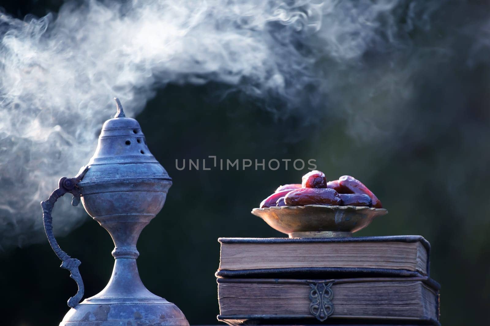 Festive greeting card for Muslim holy month Ramadan Kareem with dates, Quaran and censer