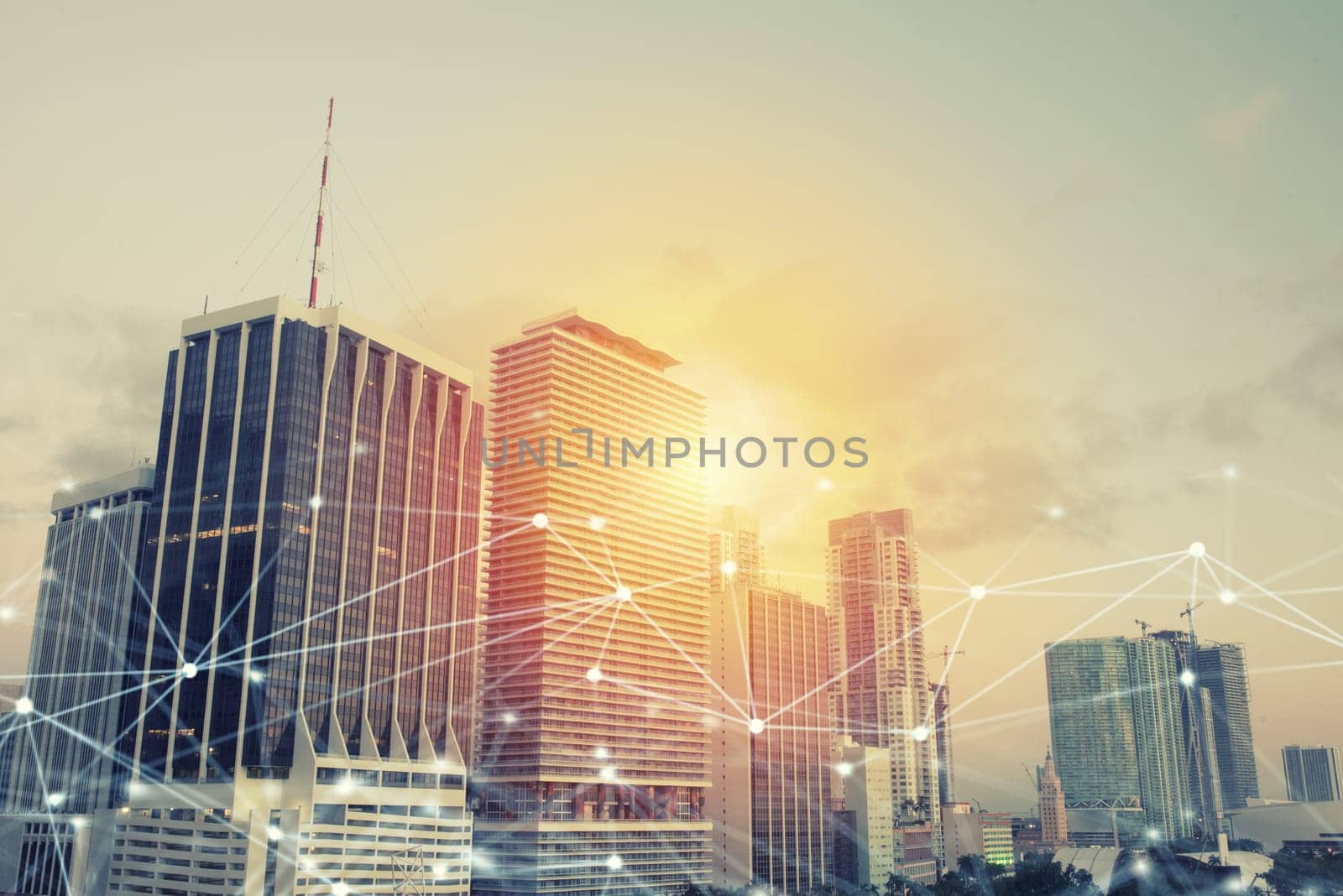 Headquarter of growing business company during sunrise with network connection effect
