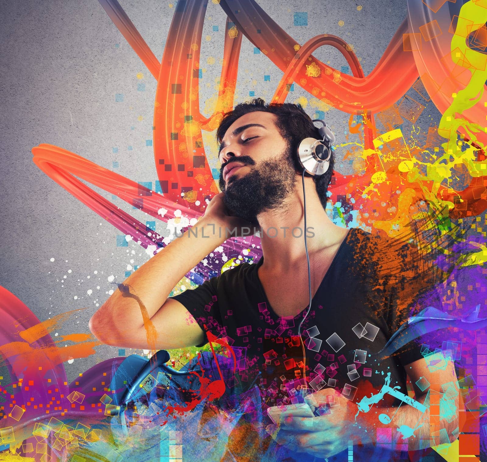 Boy listening to music with his mp3 player