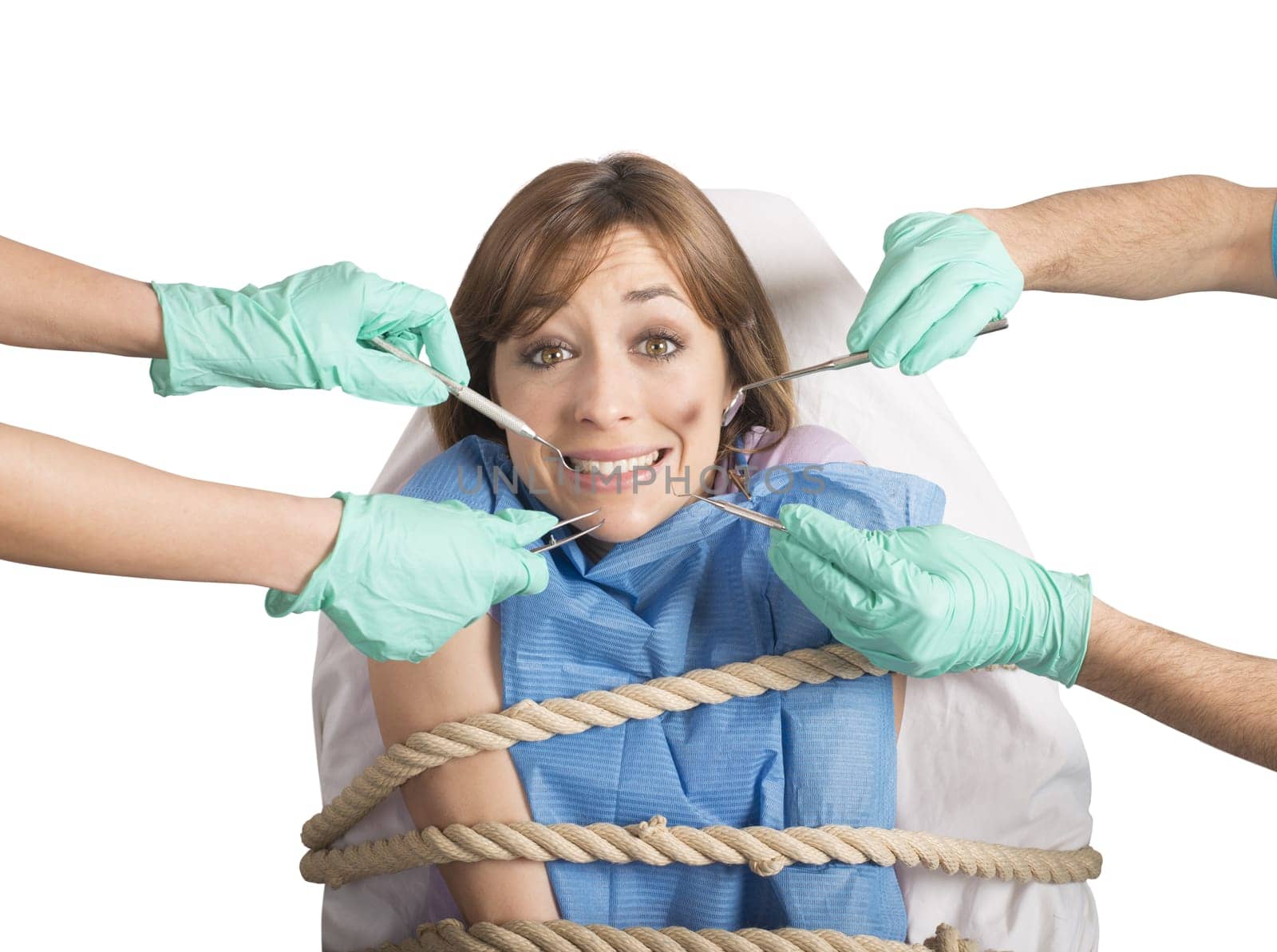 Girl tied to a chair at dentist