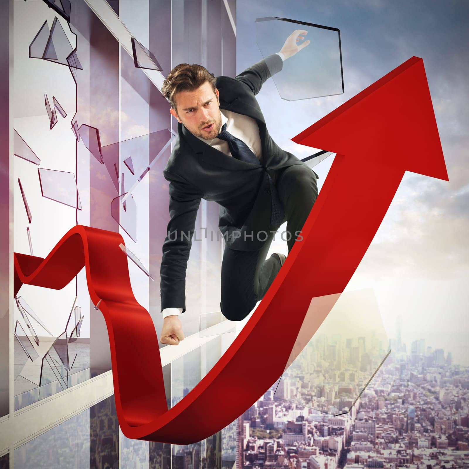 Determined businessman over a big red arrow