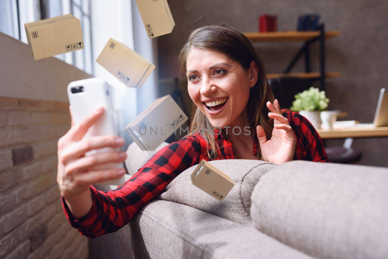 Woman does shopping through e-commerce shop. Concept of fast delivery