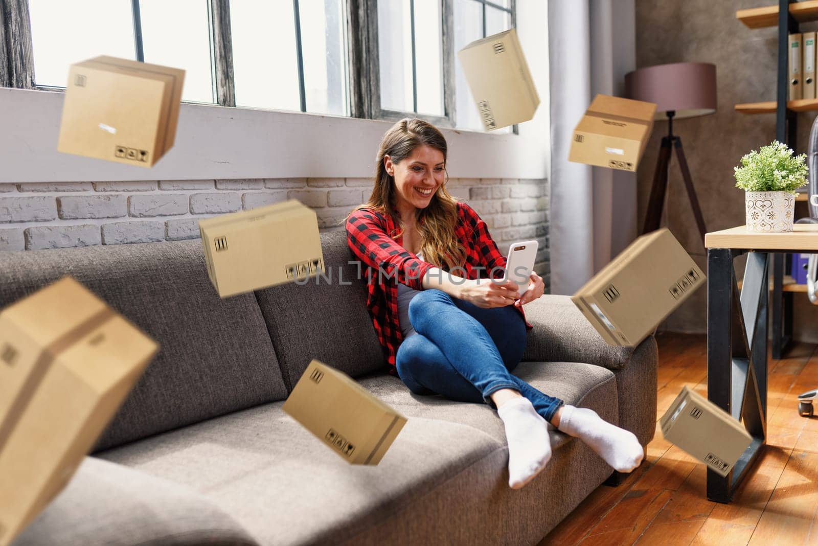Woman does shopping through e-commerce shop. Concept of fast delivery