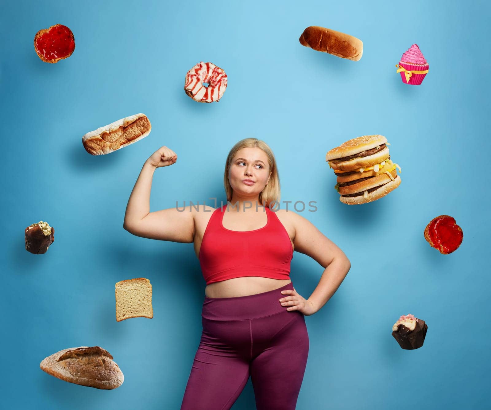 Fat girl does gym at home. thoughtful expression.