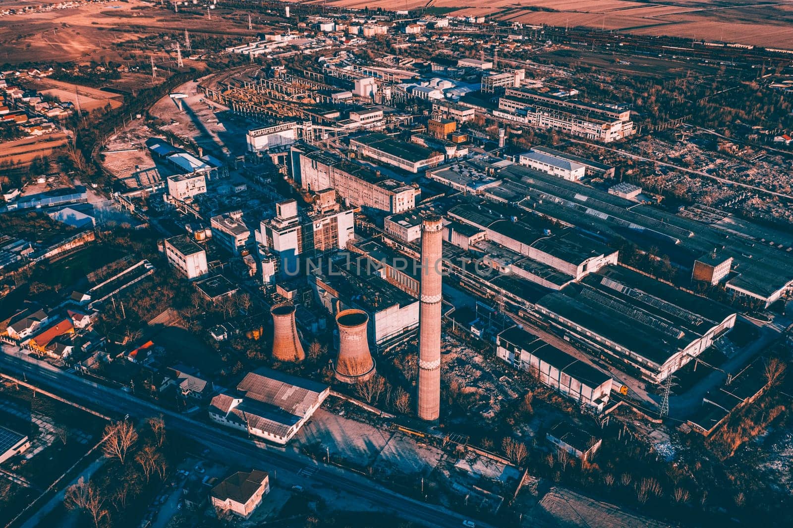 Aerial view of territory of abandoned industrial area. Exclusion zone, radiation risk, lost city, apocalyptic building.
