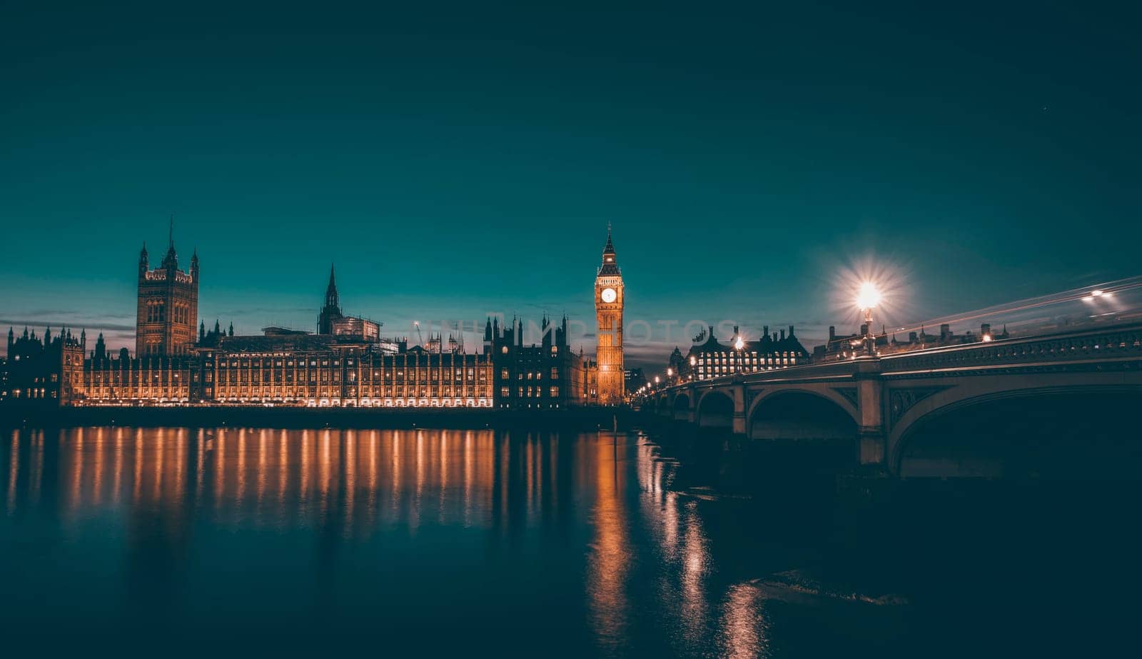Big Ben and House of Parliament at Night with reflection in Thames river, London, United Kingdom