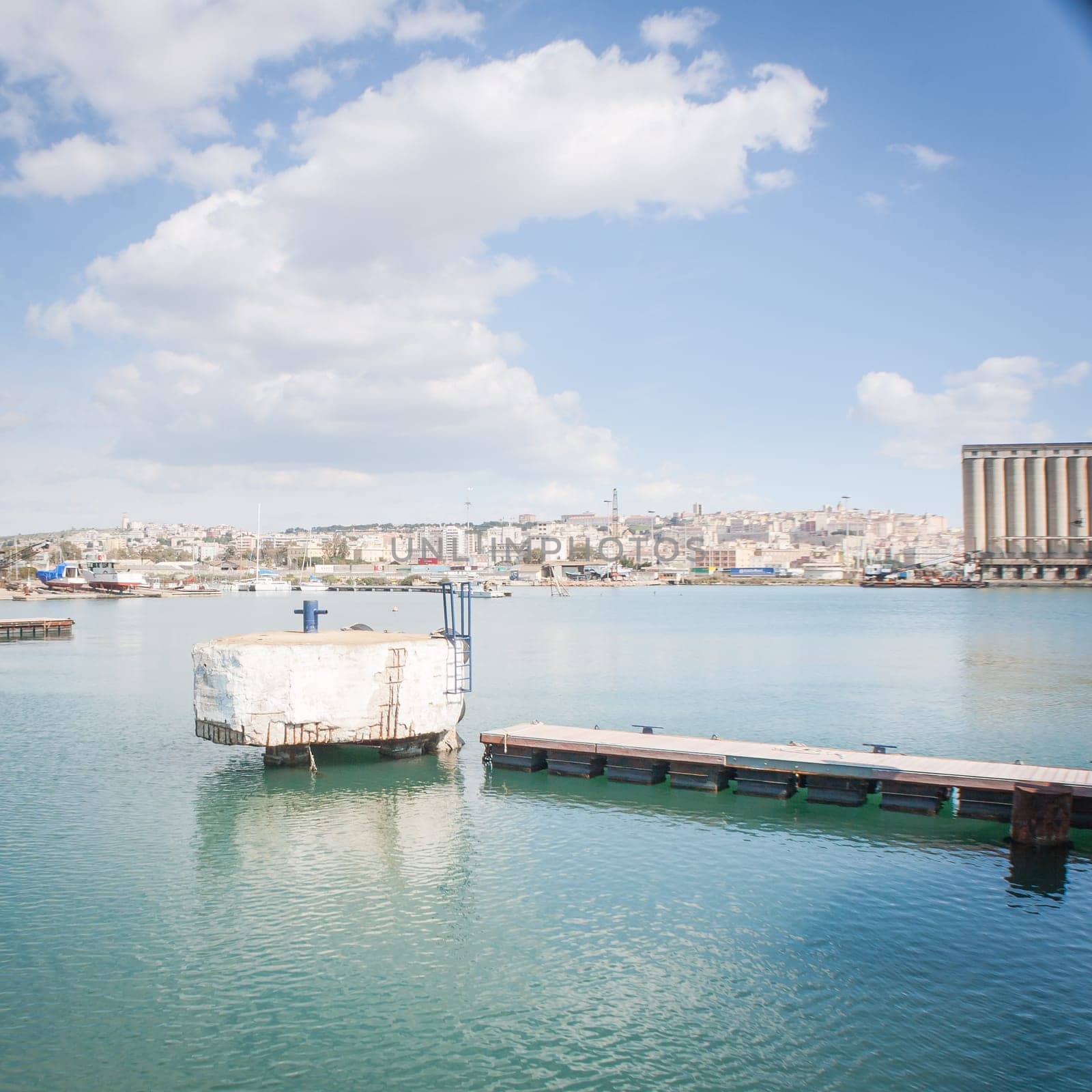 Landing at the pier in Cagliari harbor .