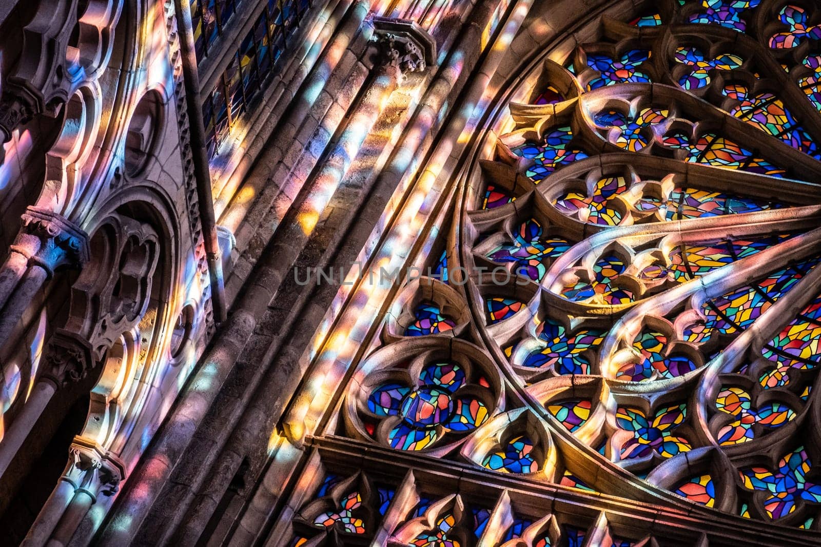 Saint-Malo, Brittany, France - Jan 15 2020 : Stained glasses and light in French cathedral Saint VIncent in  Saint-Malo
