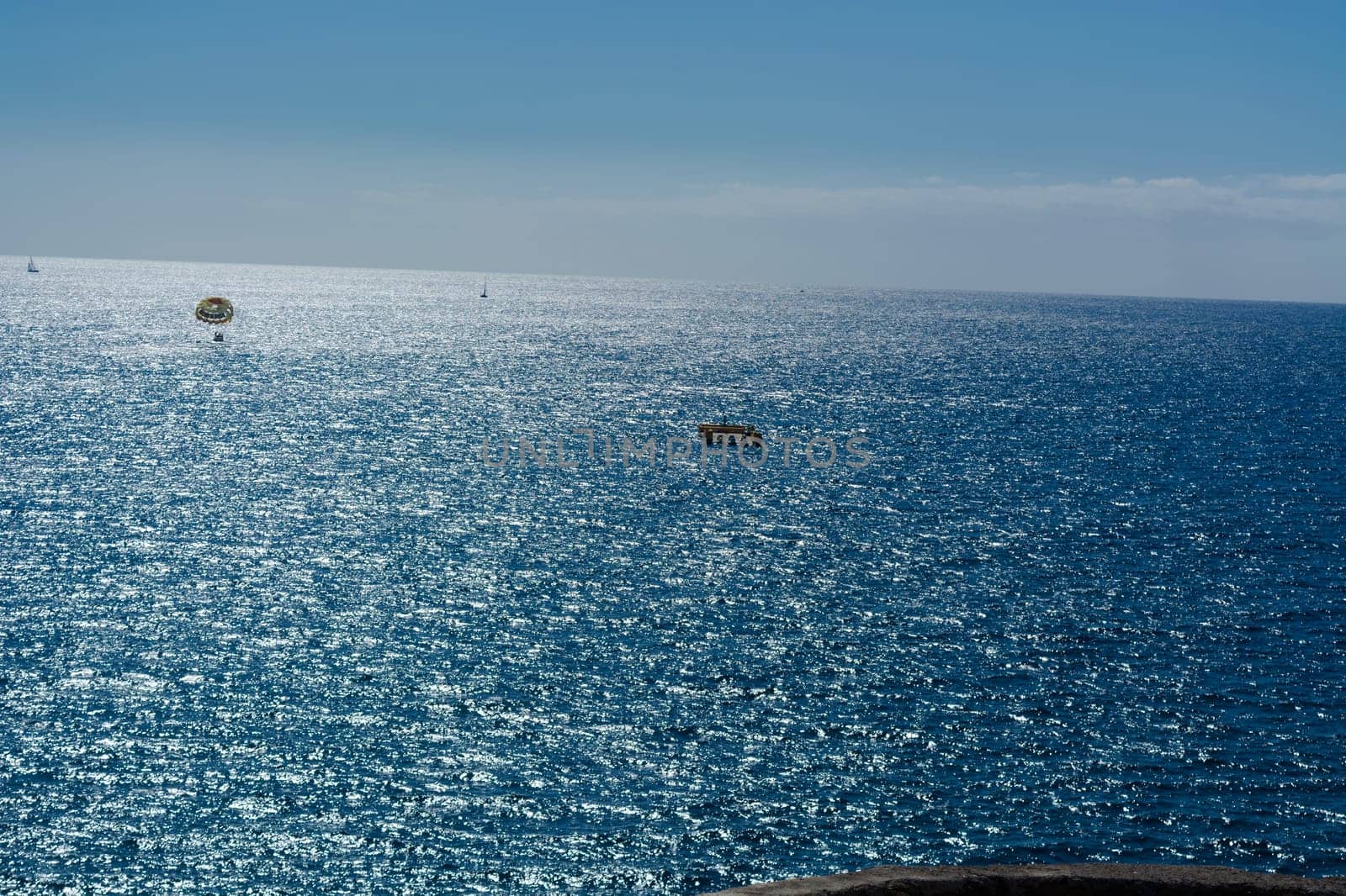 Parasailing, boat parachute. Summer water beach extreme sports..