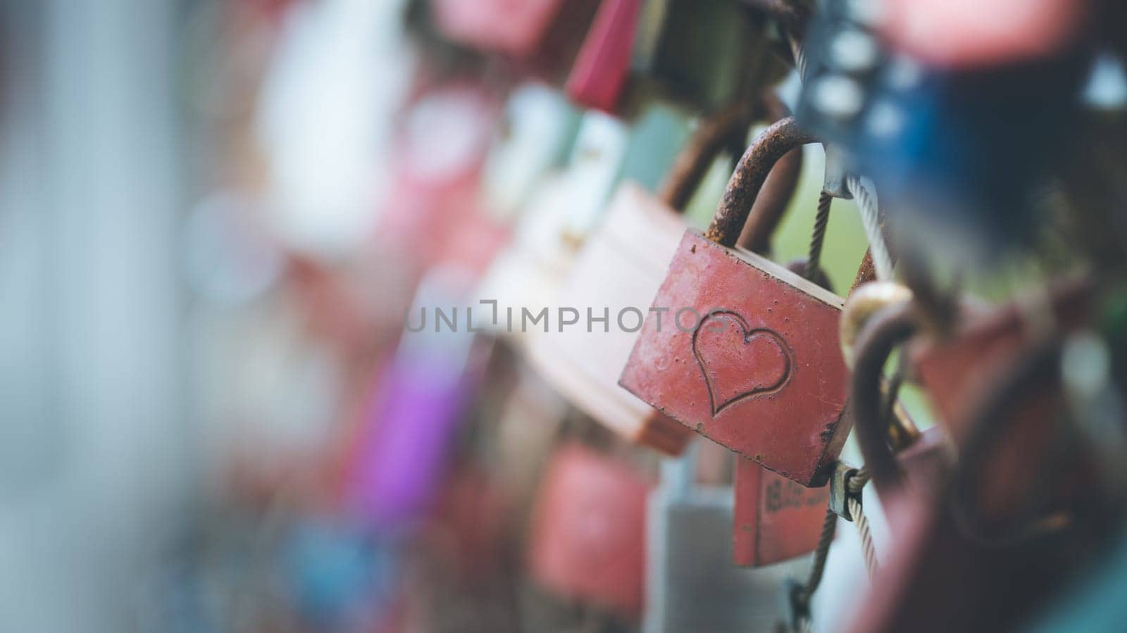 Colourful cute love locks on Markartsteg, Salzburg  Copy space and blurryness