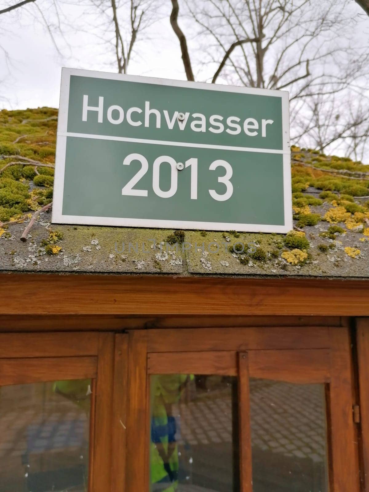 Marking the water level of the 2013 flood on the roof of a hut in the Herrenkrugpark in Magdeburg in Germany