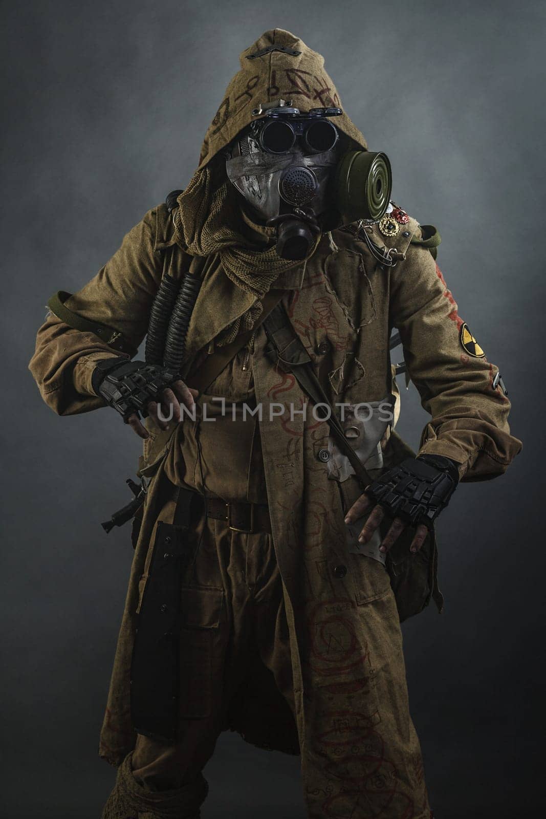 Nuclear post apocalypse. Studio shot of survivor in tatters
