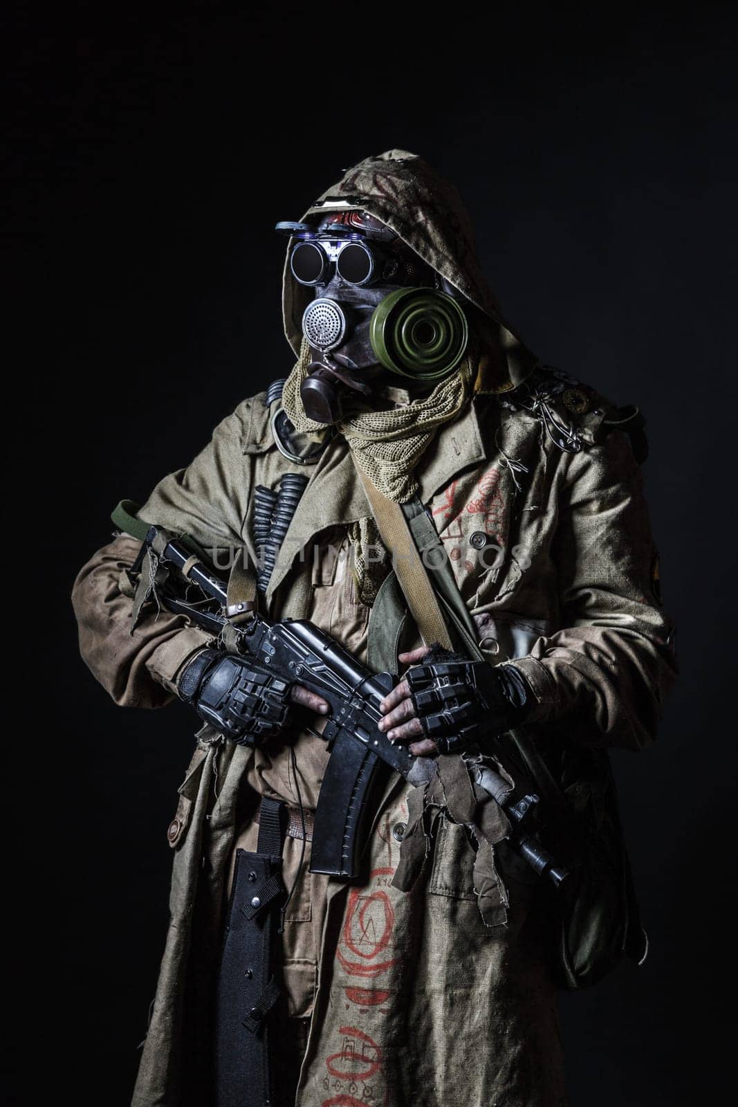 Nuclear post apocalypse. Studio shot of survivor in tatters