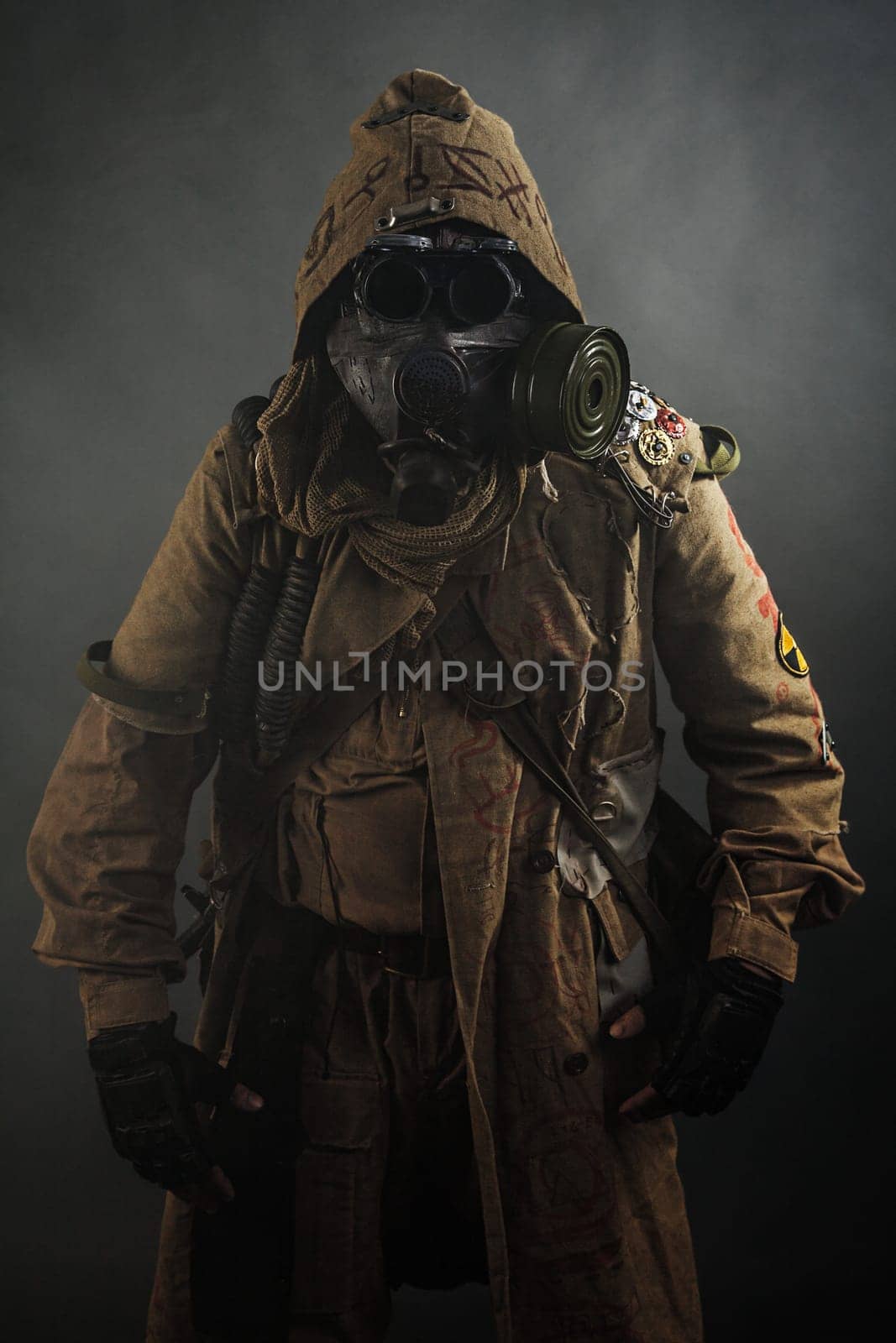 Nuclear post apocalypse. Studio shot of survivor in tatters