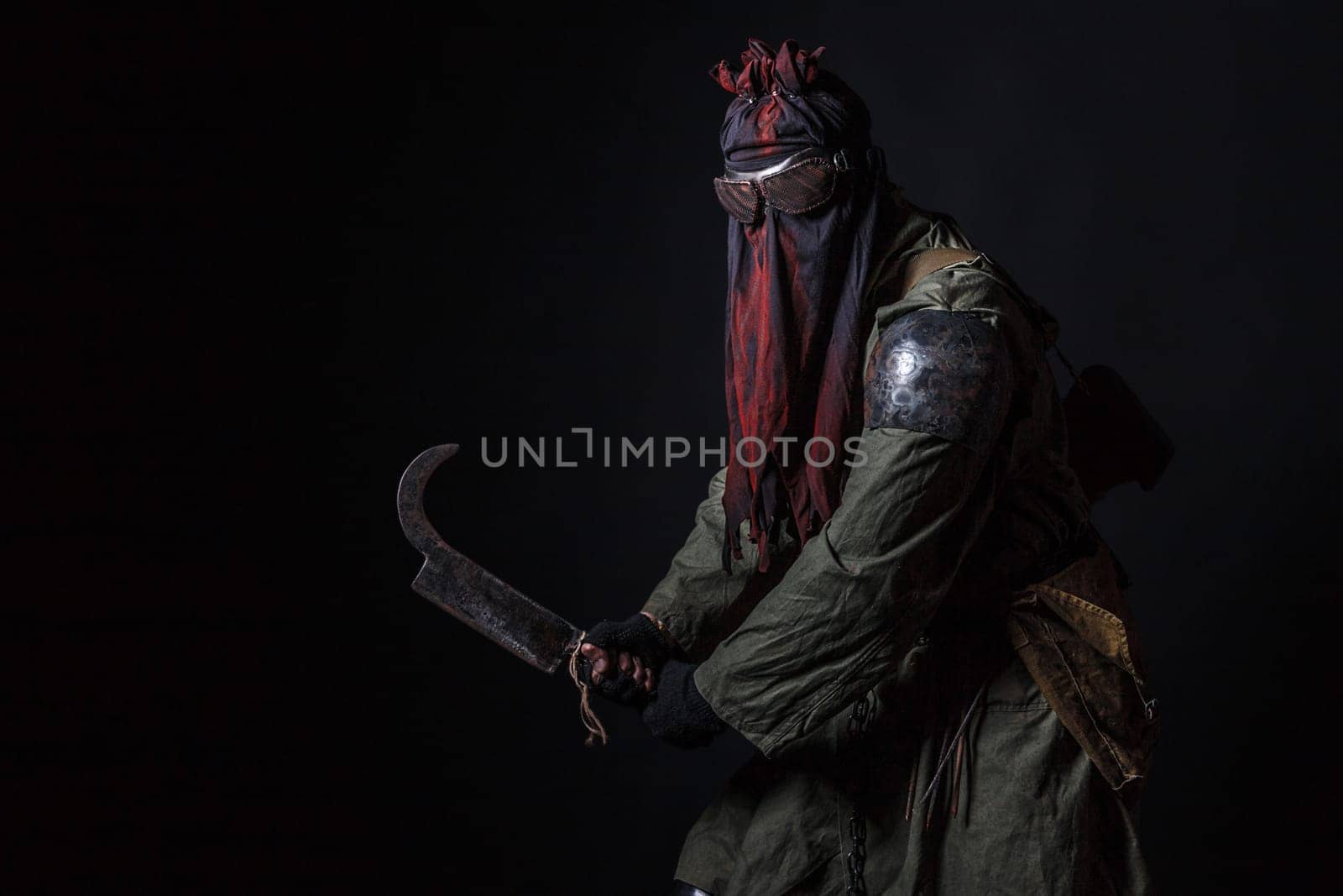 Nuclear post apocalypse. Studio shot of survivor in tatters