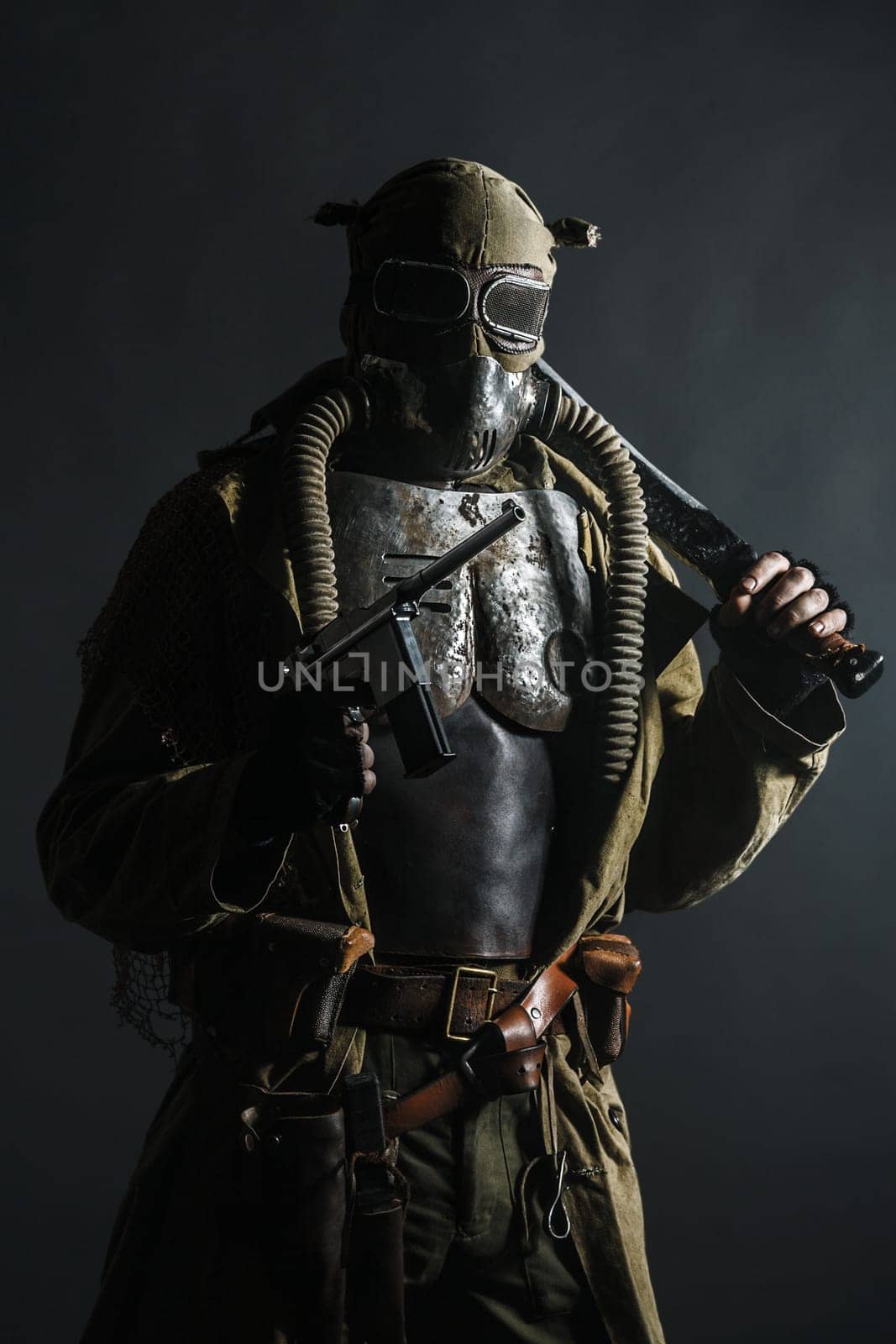 Nuclear post apocalypse. Studio shot of survivor in tatters