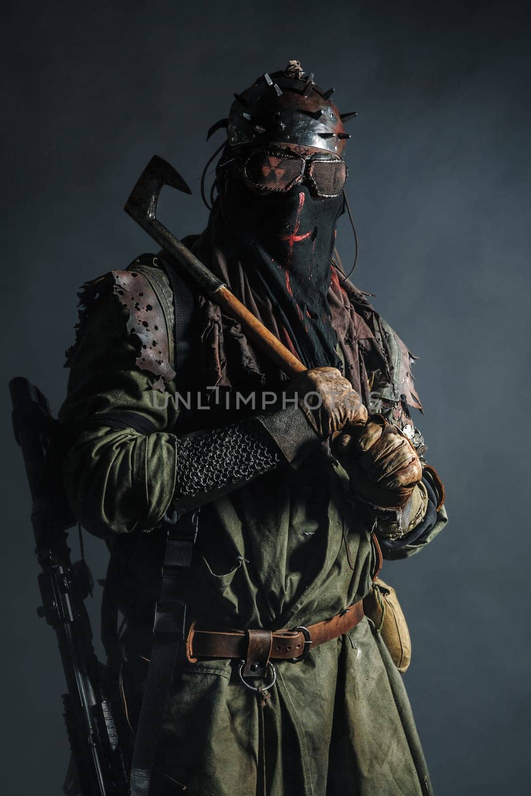 Nuclear post apocalypse. Studio shot of survivor in tatters