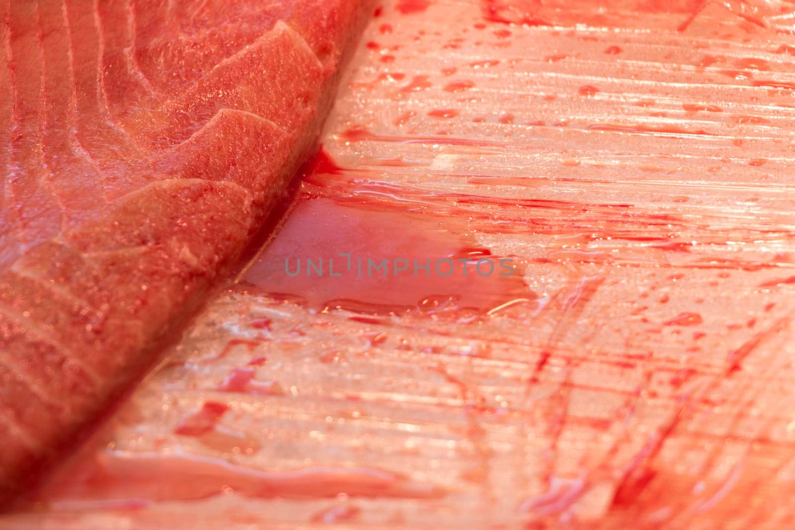 Traditional healthy sea food from seafood market with stripes pattern at butcher. Quality food for sushi lunch or fine gourmet dinner.
