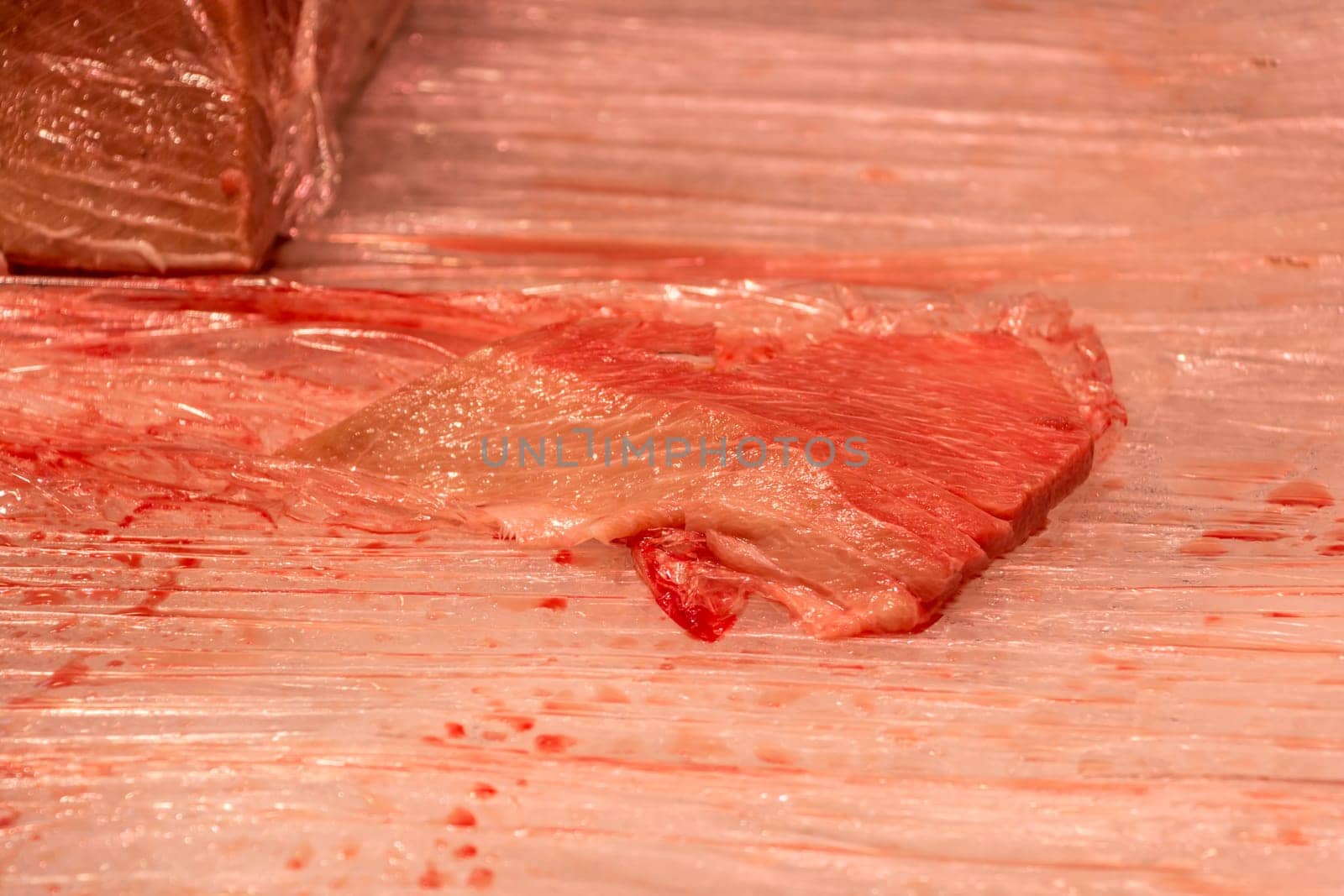 Traditional healthy sea food from seafood market with stripes pattern at butcher. Quality food for sushi lunch or fine gourmet dinner.